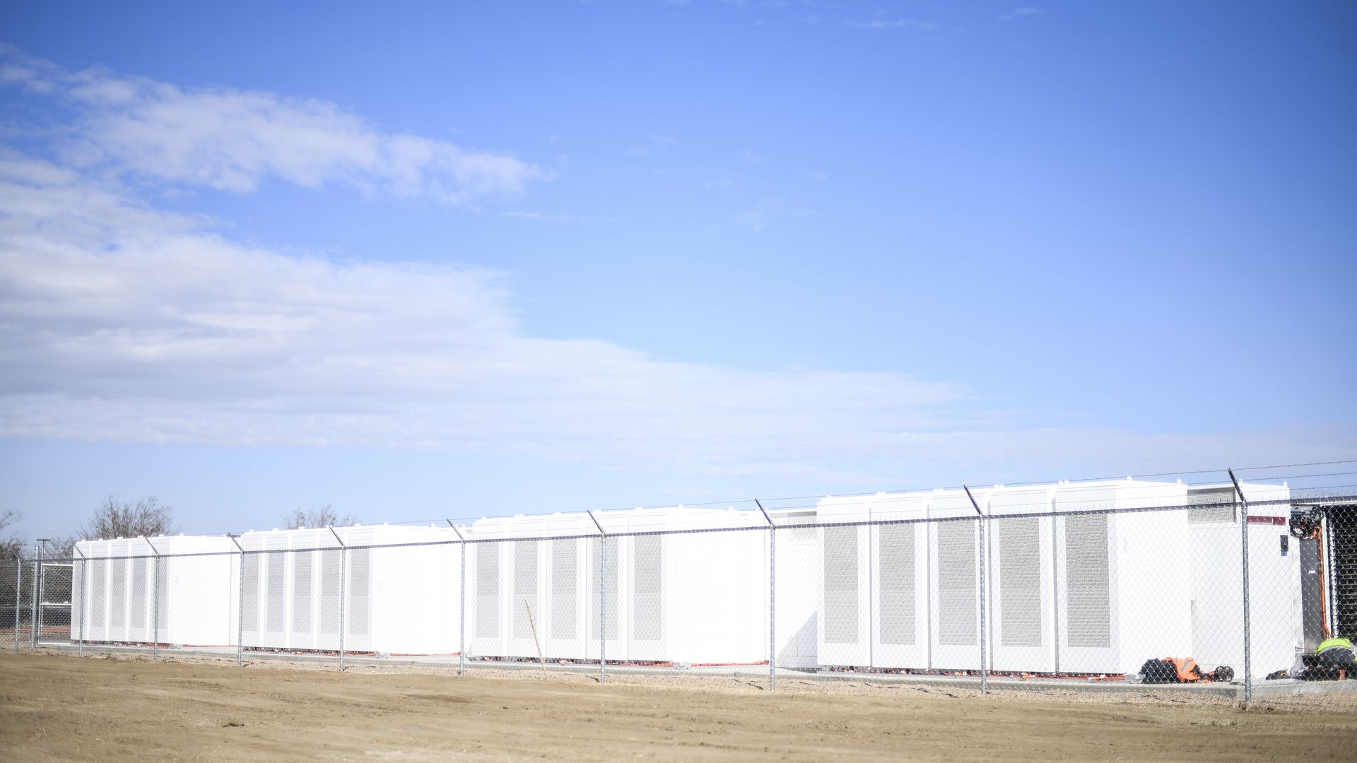 a fenced enclosure of battery units