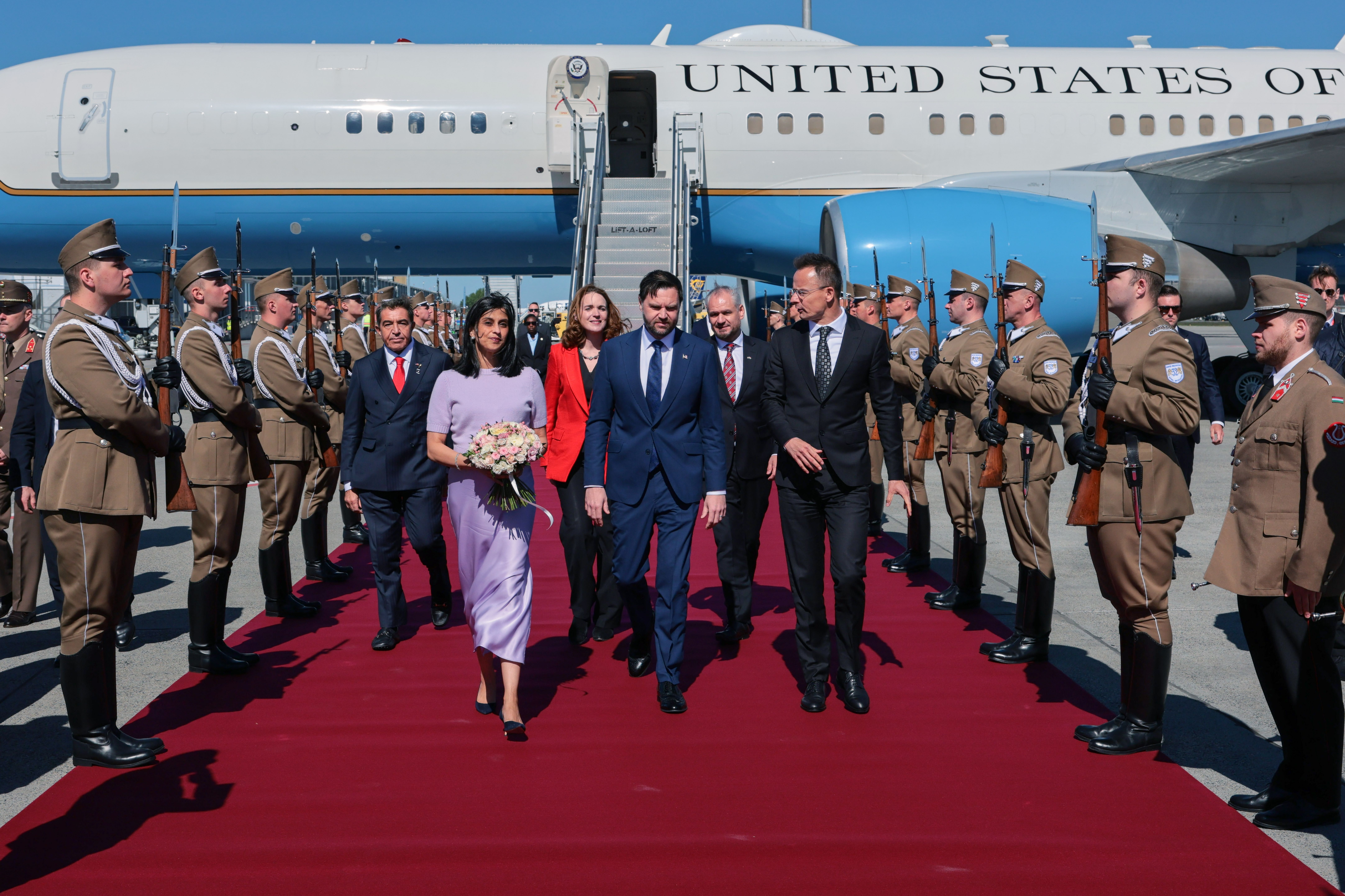 7: Hungarian Foreign Minister Peter Szijjarto welcomes U.S. Vice President JD Vance and second lady Usha Vance as they arrive at Budapest Ferenc Liszt International Airport on April 7, 2026 in Budapest, Hungary. Vance is supporting Orban's bid for reelection in Hungarian parliamentary elections sche