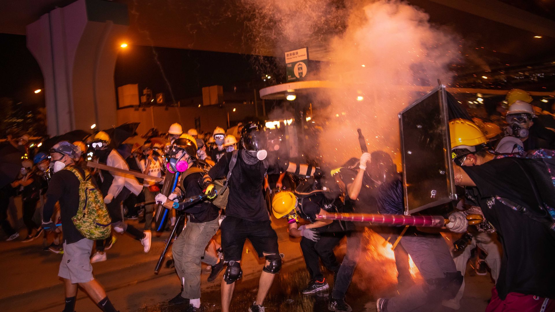 Hundreds of thousands of protesters running away from the tear gas during an anti-extradition bill march in Hong Kong