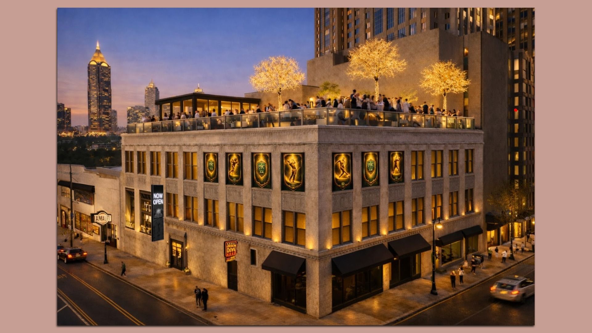 Evening city scene showing a lit, three-story building with outdoor rooftop seating decorated with illuminated trees. People gather on the rooftop with skyscrapers and sunset sky in background.