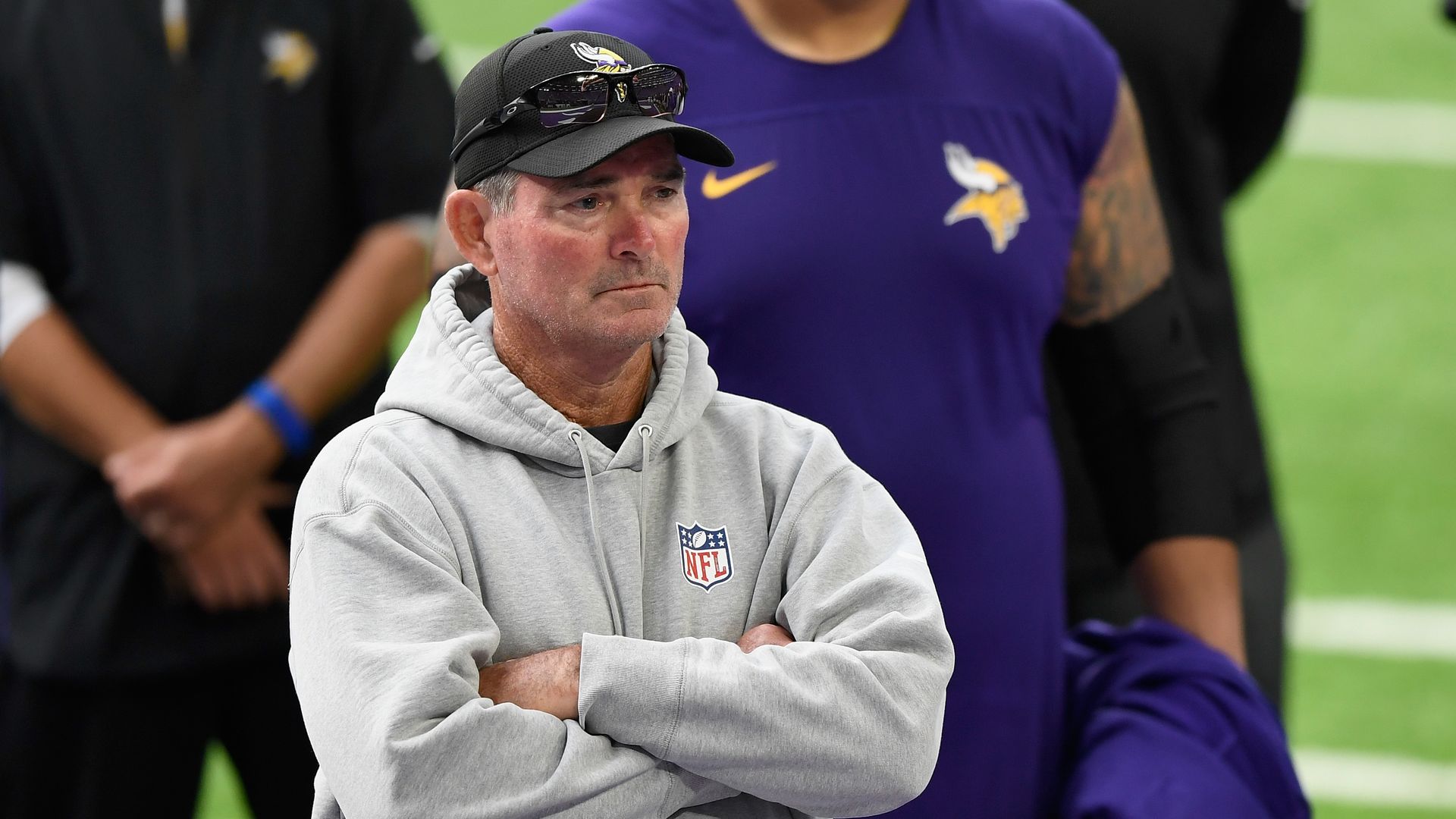 mike zimmer, coach of the vikings, watching the field