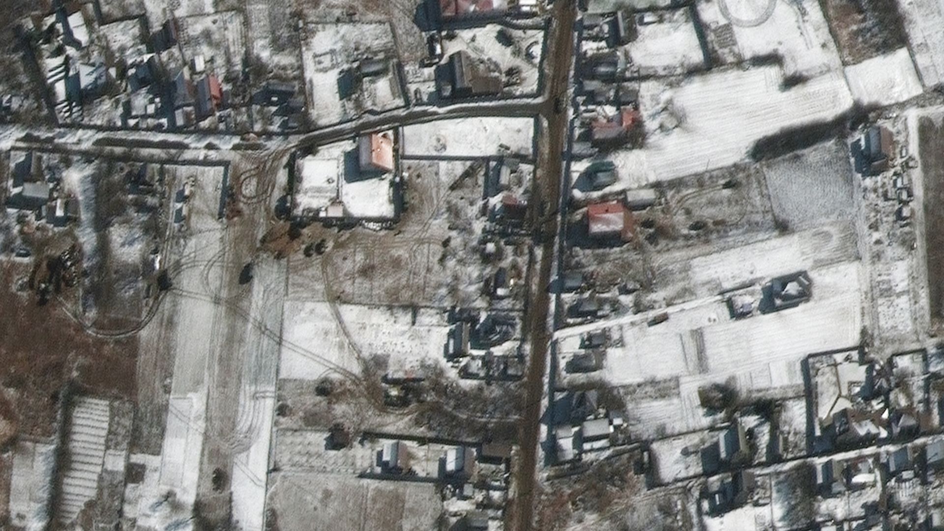 Russian military vehicles are seen sitting on roadways in residential areas in the town of Ozera, Ukraine, near Kyiv.