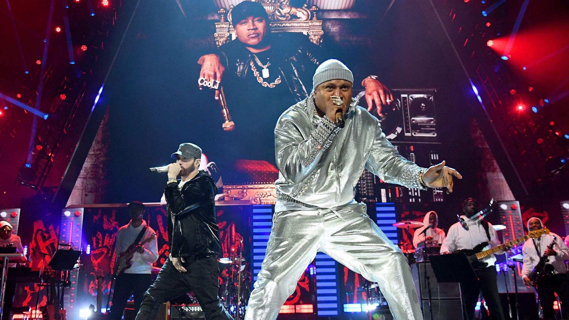 Eminem and LL Cool J perform on stage together at the Rock Hall ceremony.