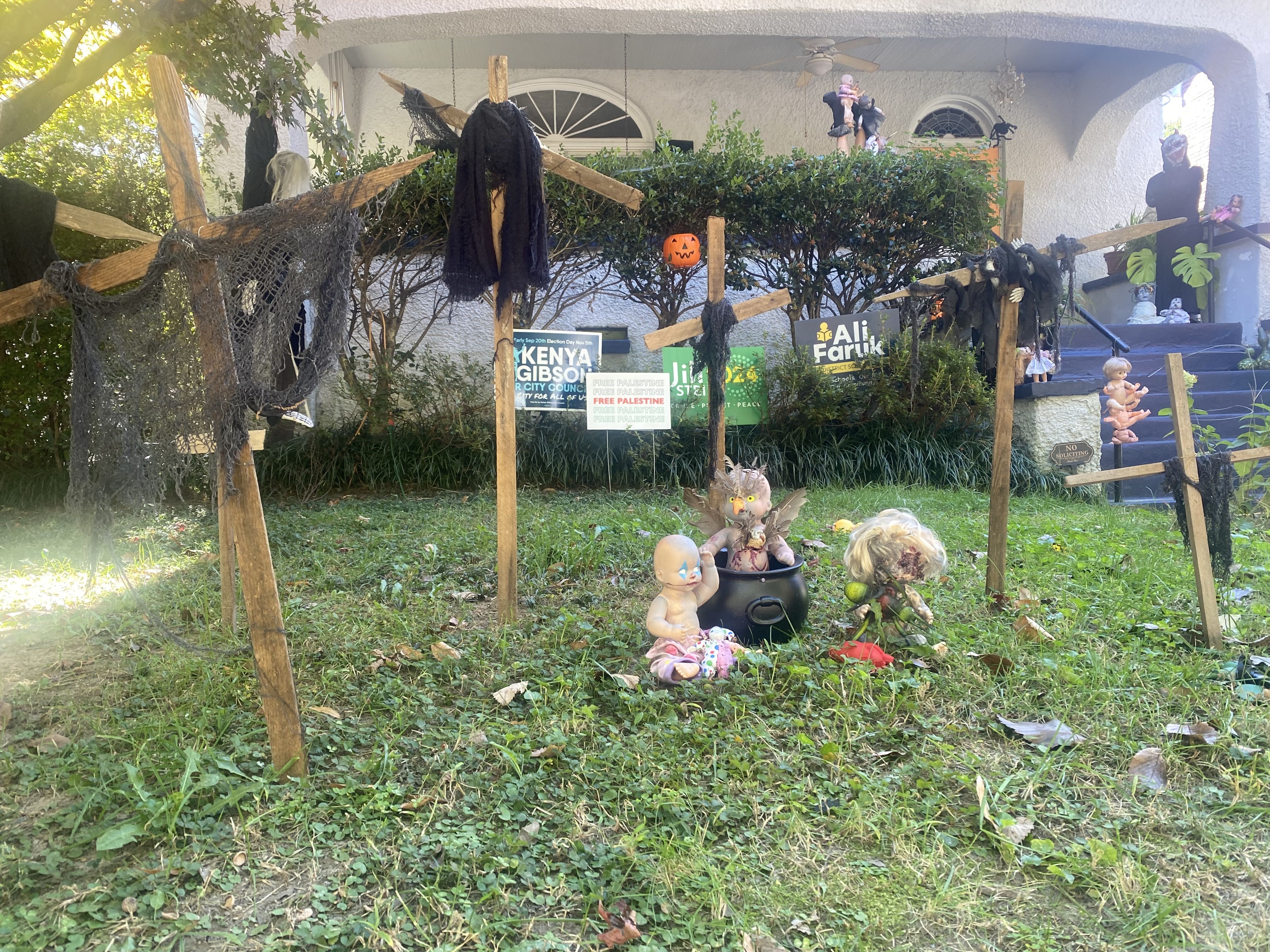 Creepy dolls in a yard 