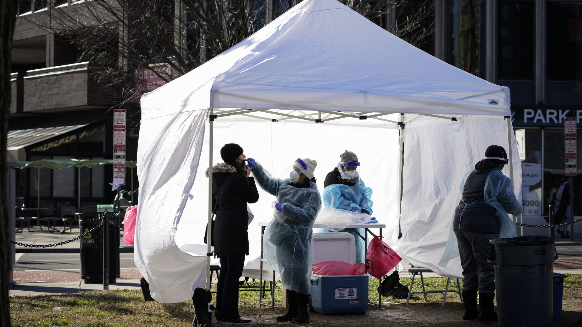 A coronavirus testing clinic is set up under a tent at a public park in Washington, D.C.
