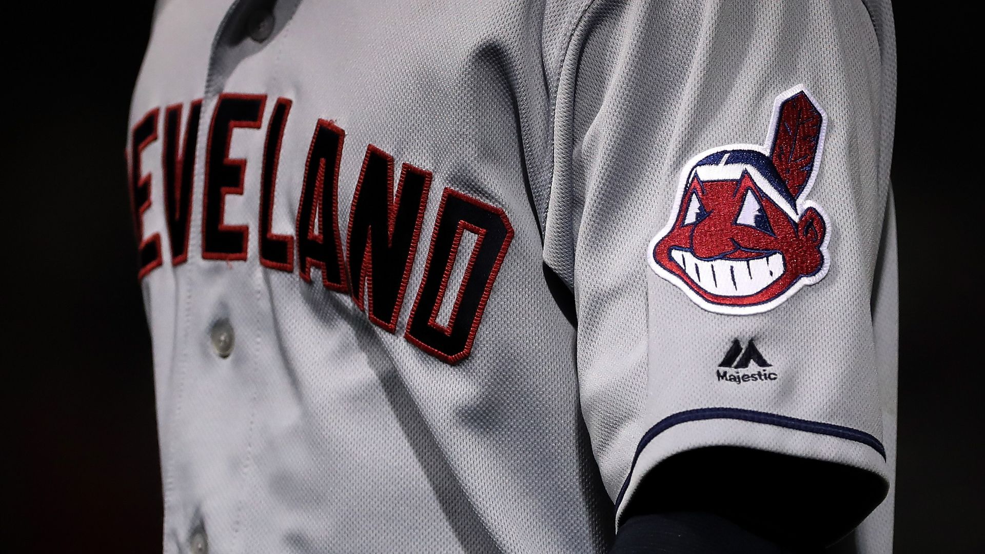 A player wearing the Cleveland Indians jersey with the logo on the sleeve