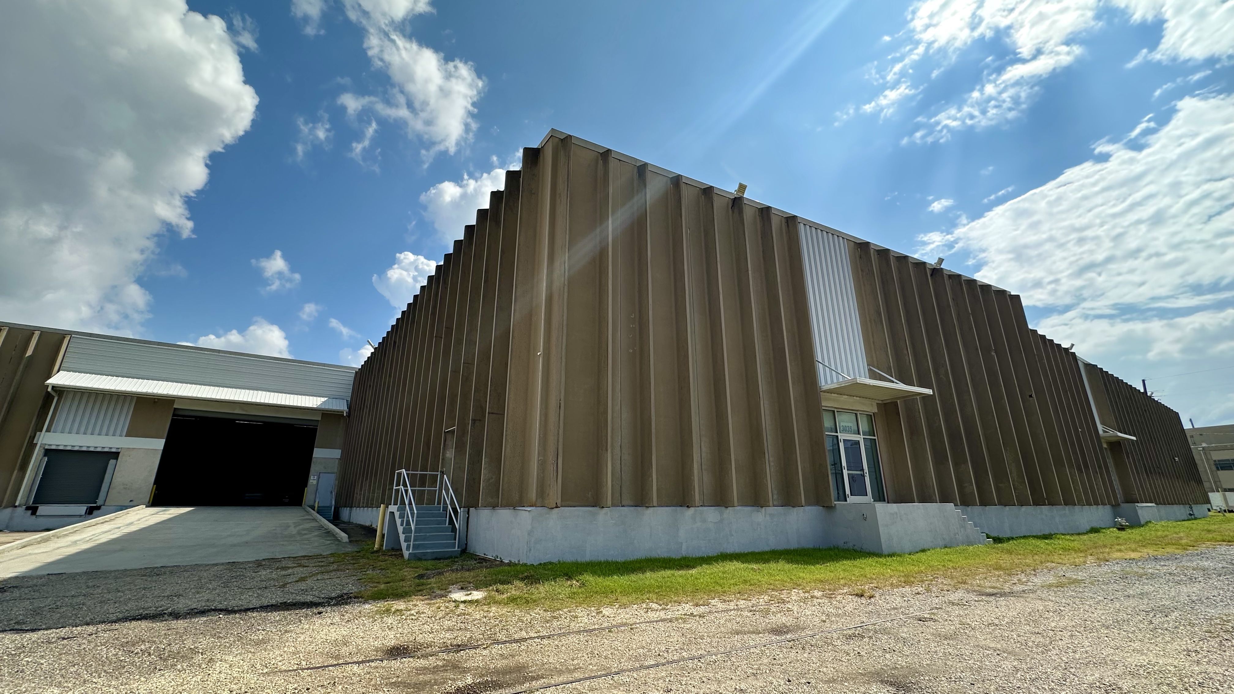 Photo shows the exterior of a building.