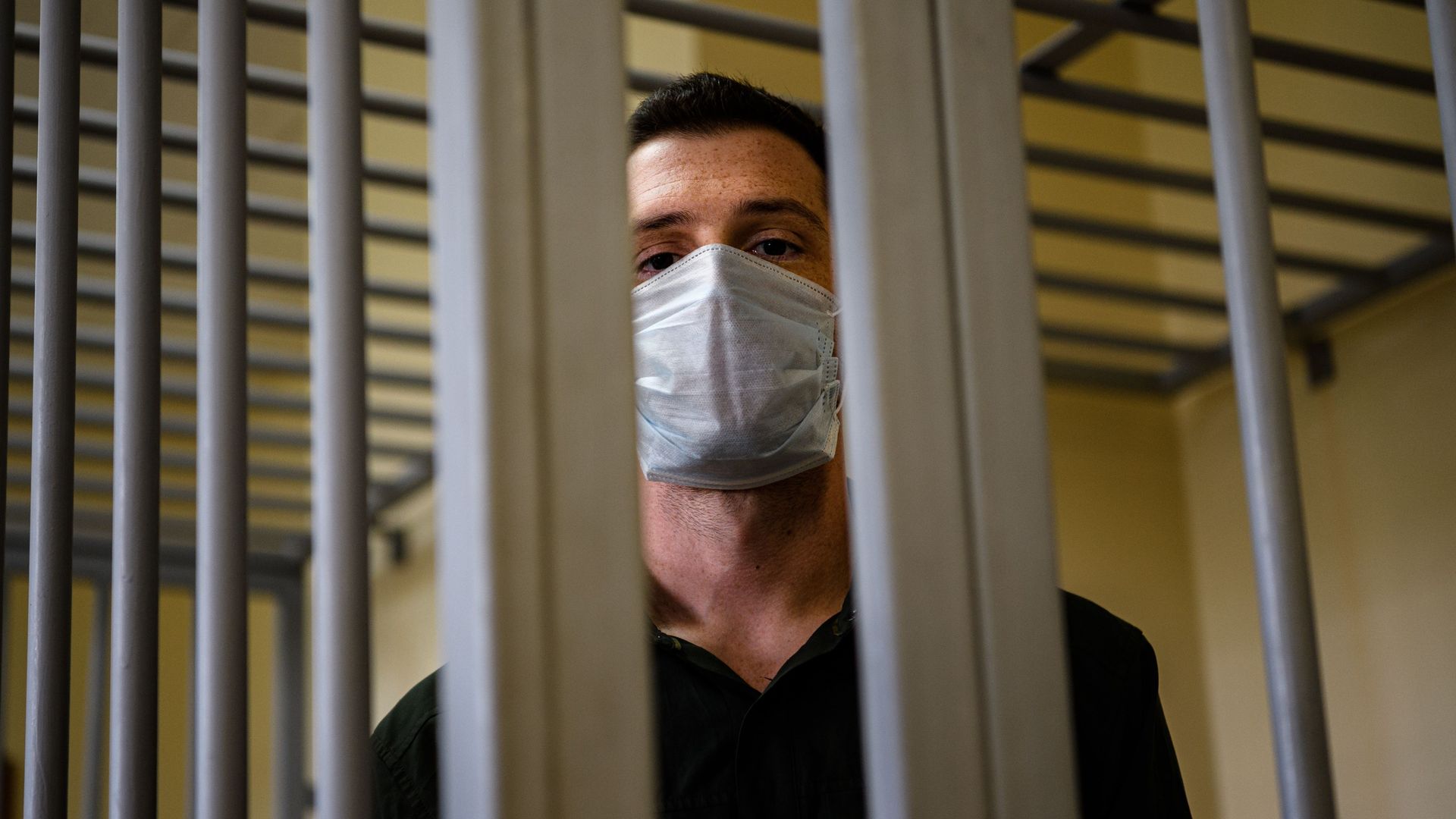Former U.S. Marine Trevor Reed in a defendants' cage in a Moscow court in July 2020.