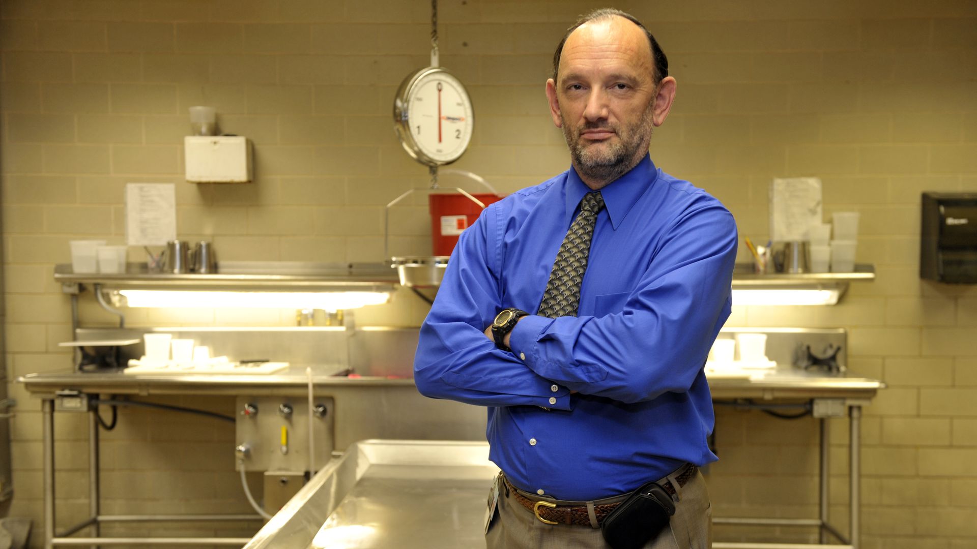 Maryland chief medical examiner Dr. David Fowler in a medical room.