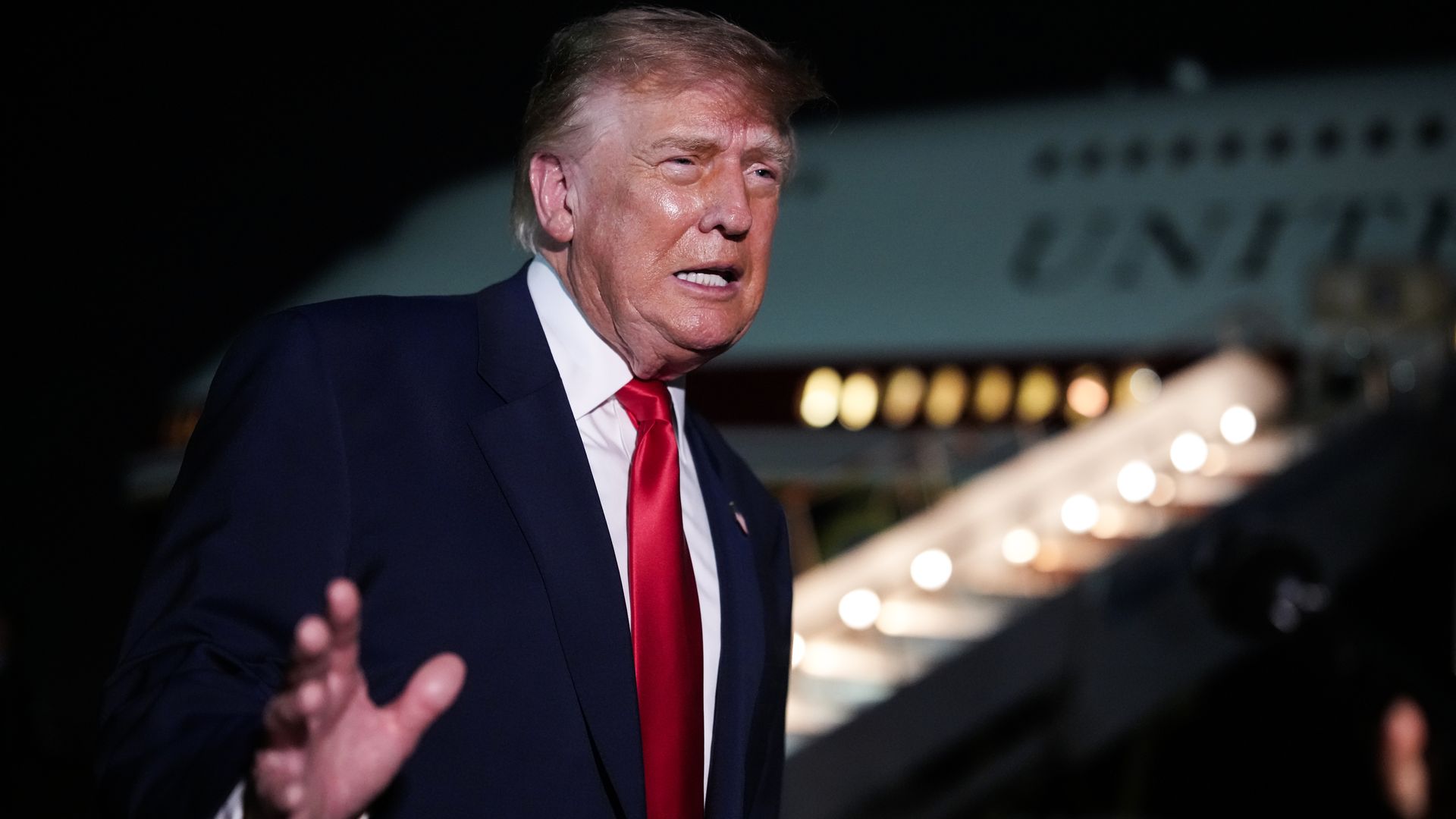 President Trump speaks to reporters on an airport tarmac before boarding Air Force One on Sept. 10. Photo: Andrew Harnik/Getty Images