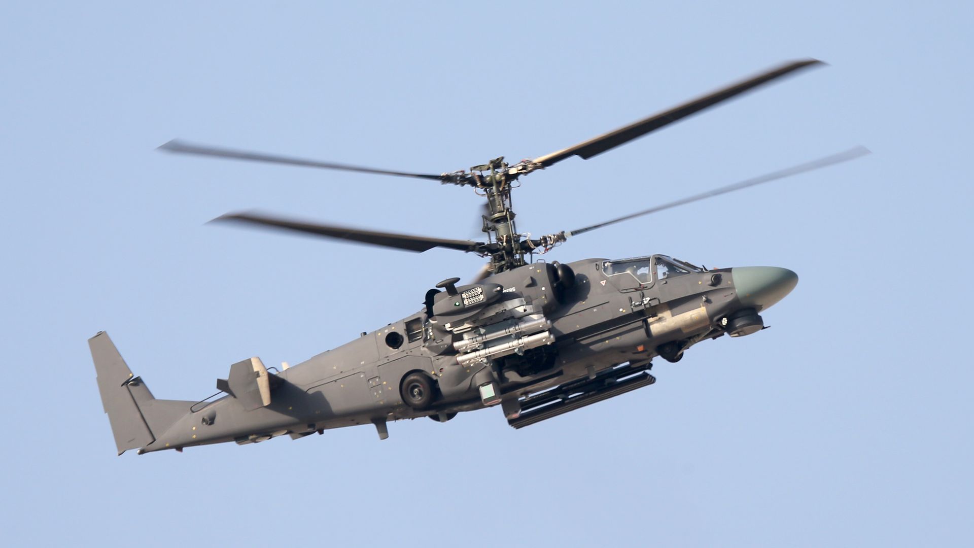 A Kamov Ka-52 "Alligator" rehearses a demonstration flight ahead of the 2021 Dubai Airshow