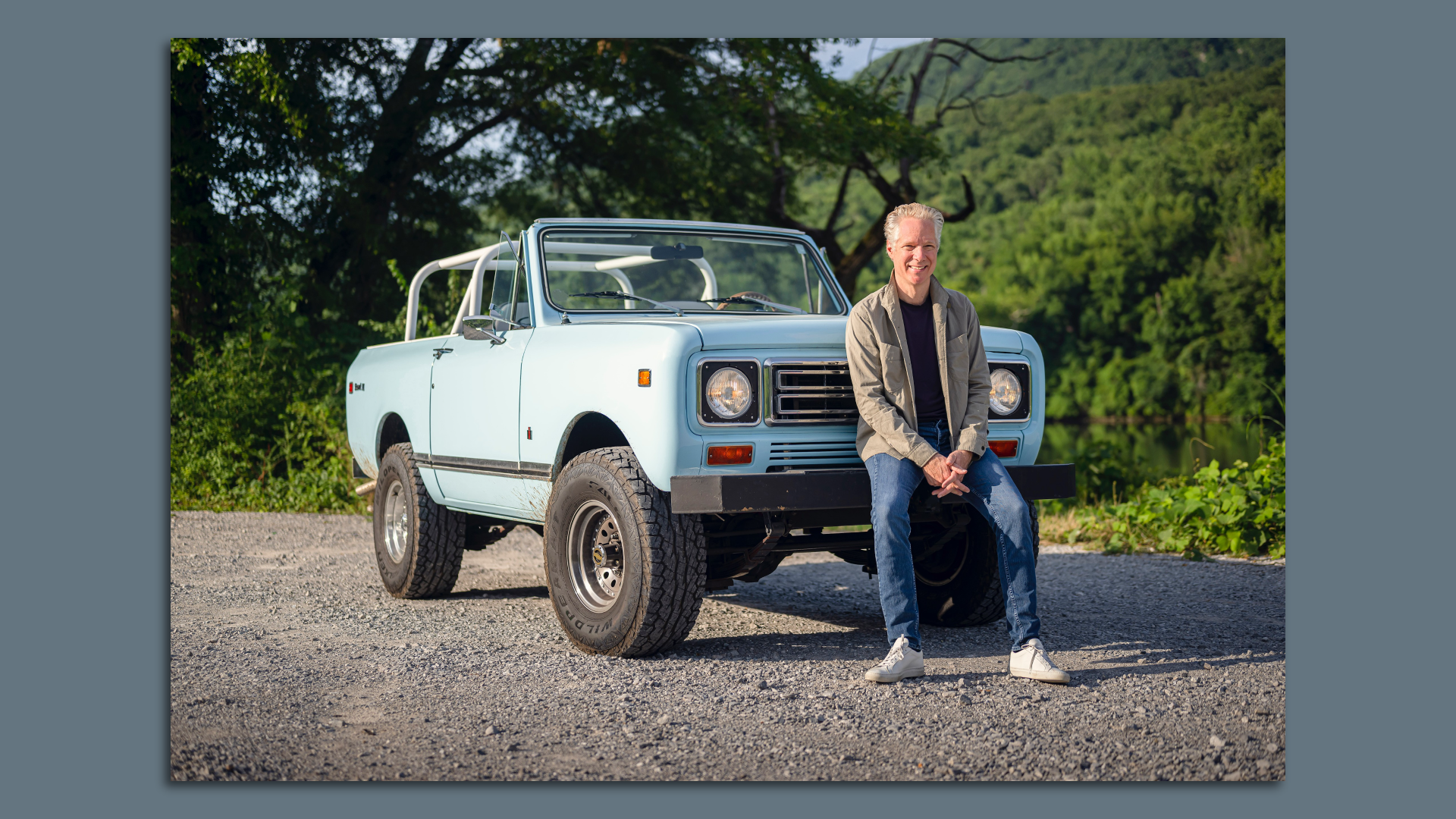 Image of Scout CEO Scott Keogh with a vintage Scout SUV