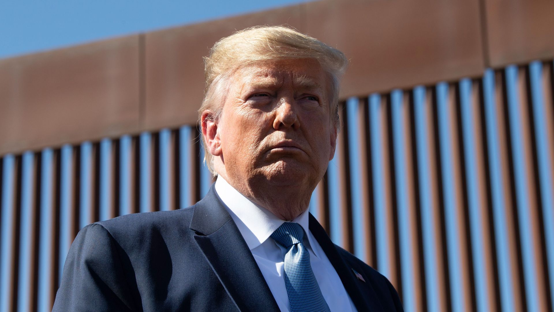 President Donald Trump visits the US-Mexico border fence in Otay Mesa, California on September 18