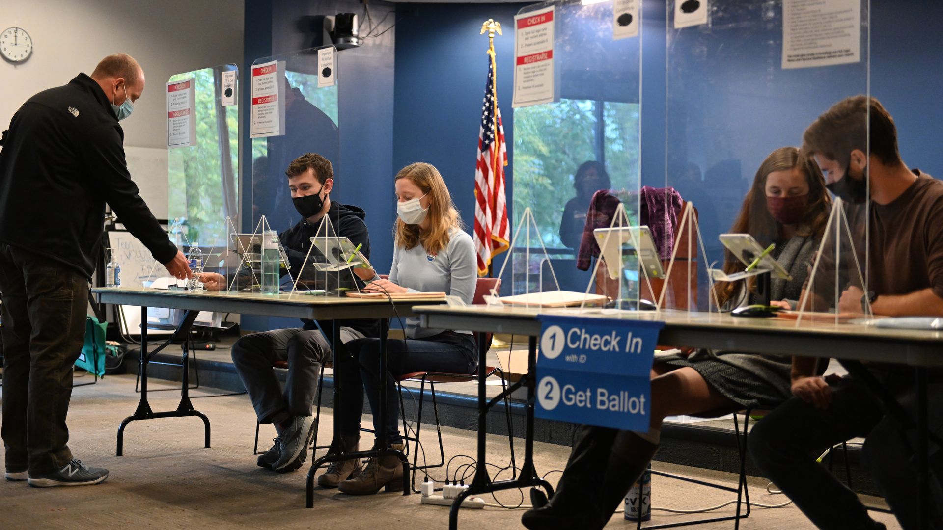 A voter arrives at a polling location in Arlington during the Virginia governor election on November 2, 2021 in Virginia,
