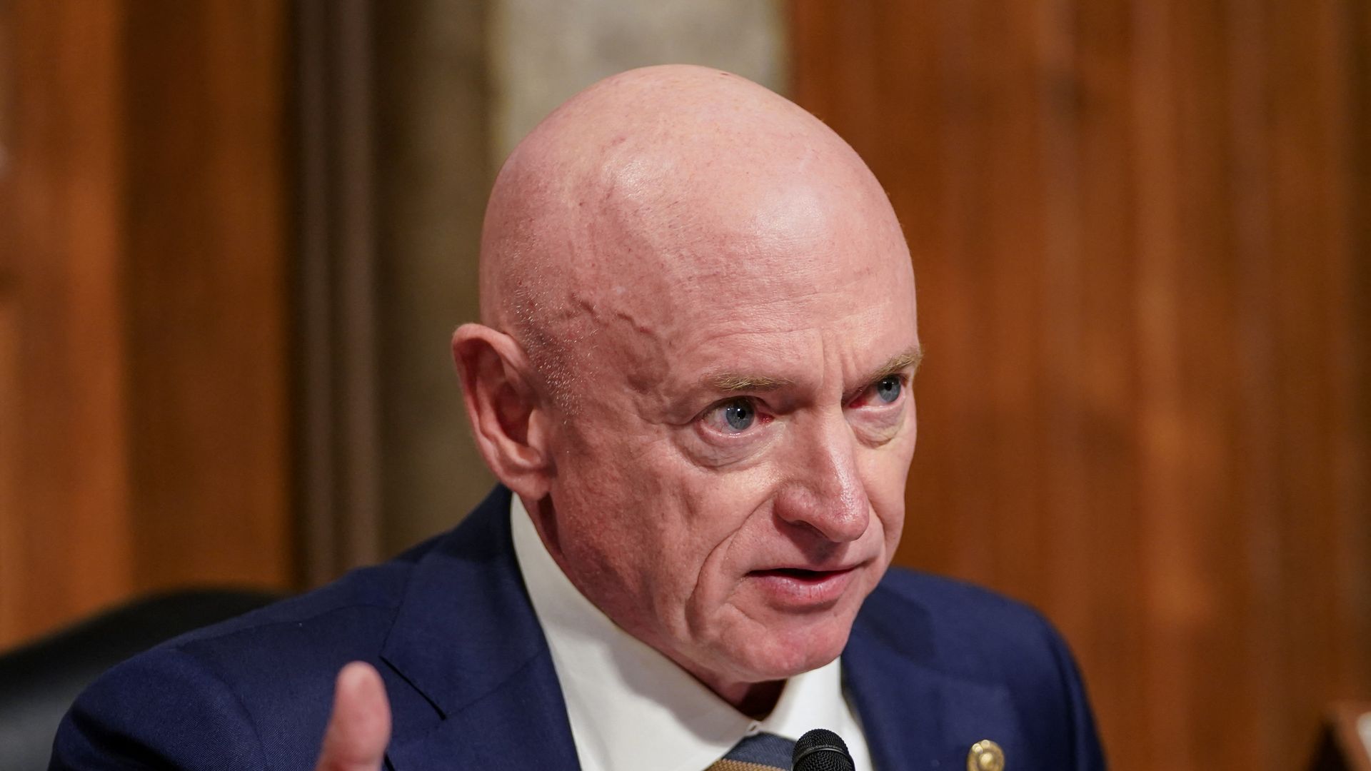 Mark Kelly speaks during a congressional hearing. 