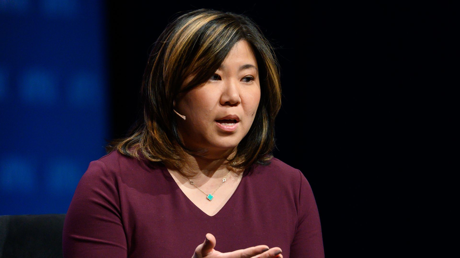 Rep. Grace Meng is seen addressing an audience.