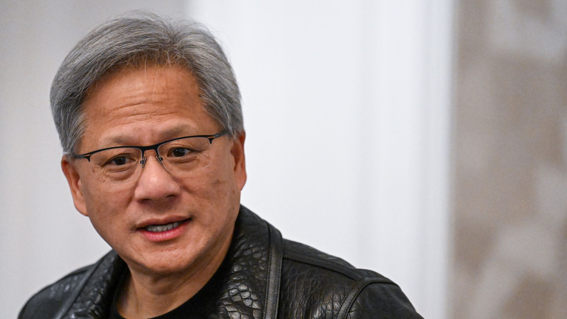 Photo of Jensen Huang speaking