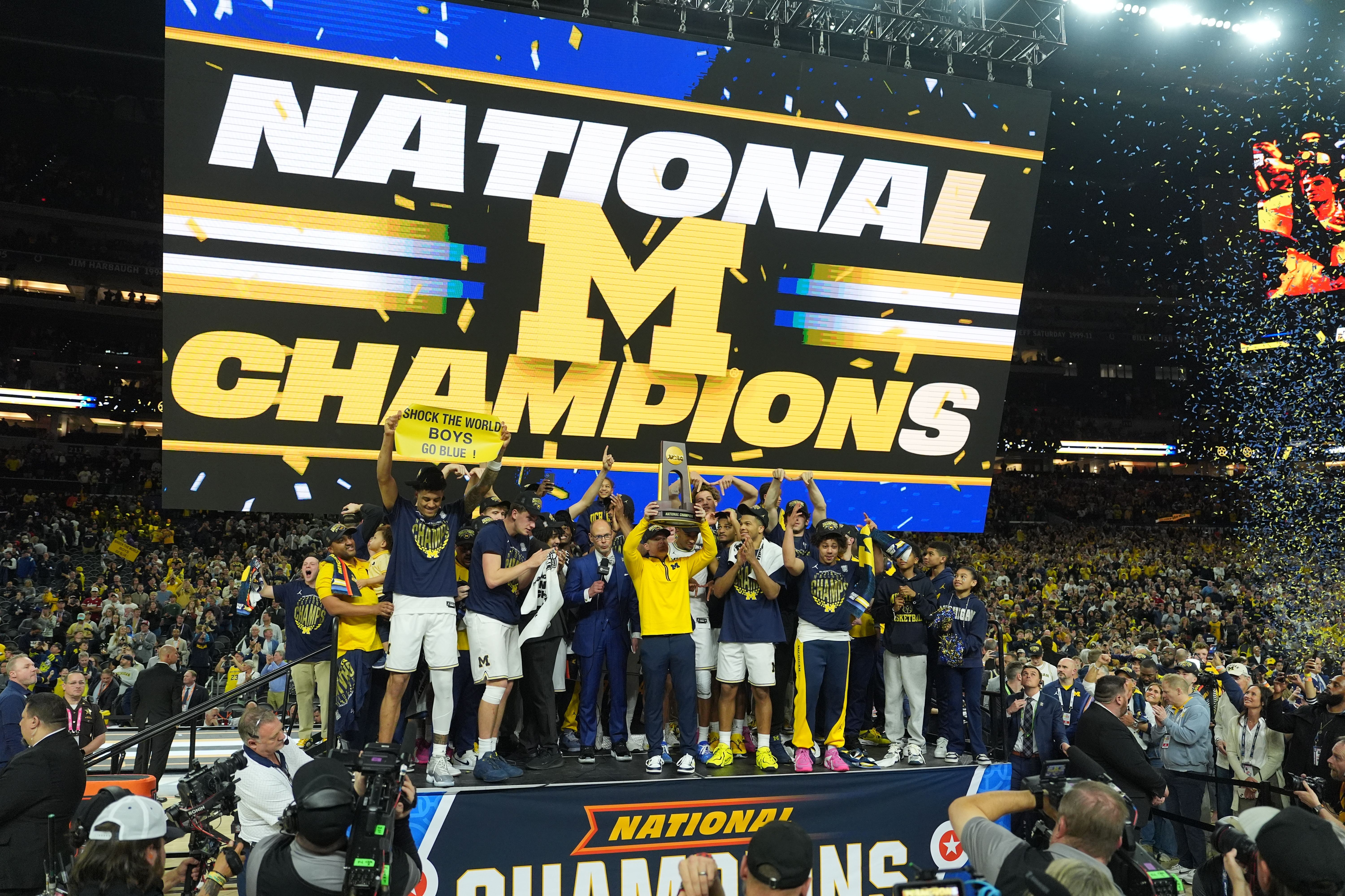 Michigan celebrates after defeating UConn in the NCAA college basketball tournament national championship game at the Final Four, Monday, April 6, 2026, in Indianapolis. (AP Photo/Michael Conroy)
