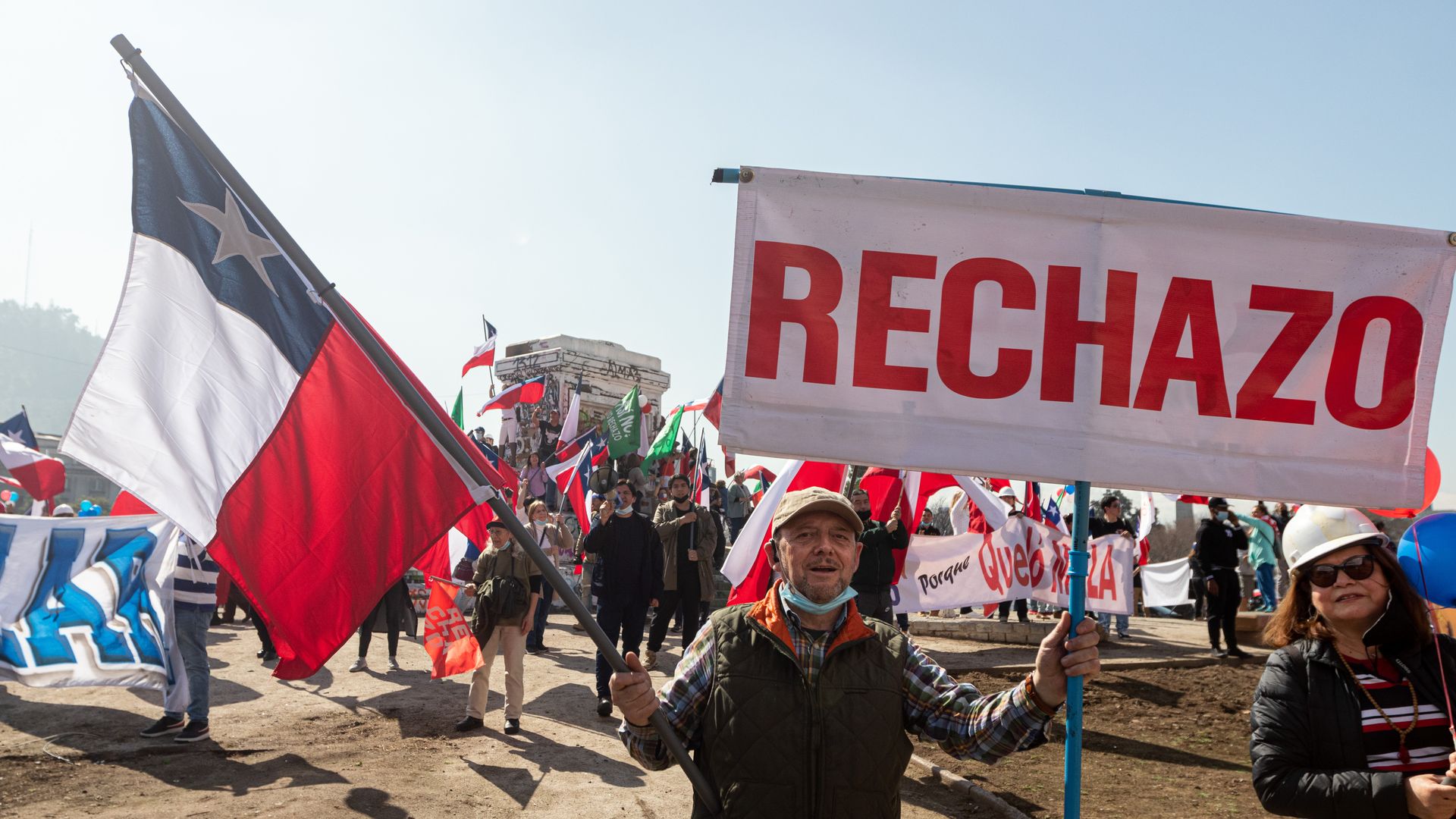 Dozens of people participate in a demonstration in Plaza Italia in rejection of the next constitutional plebiscite, in Santiago, Chile on Aug. 20.