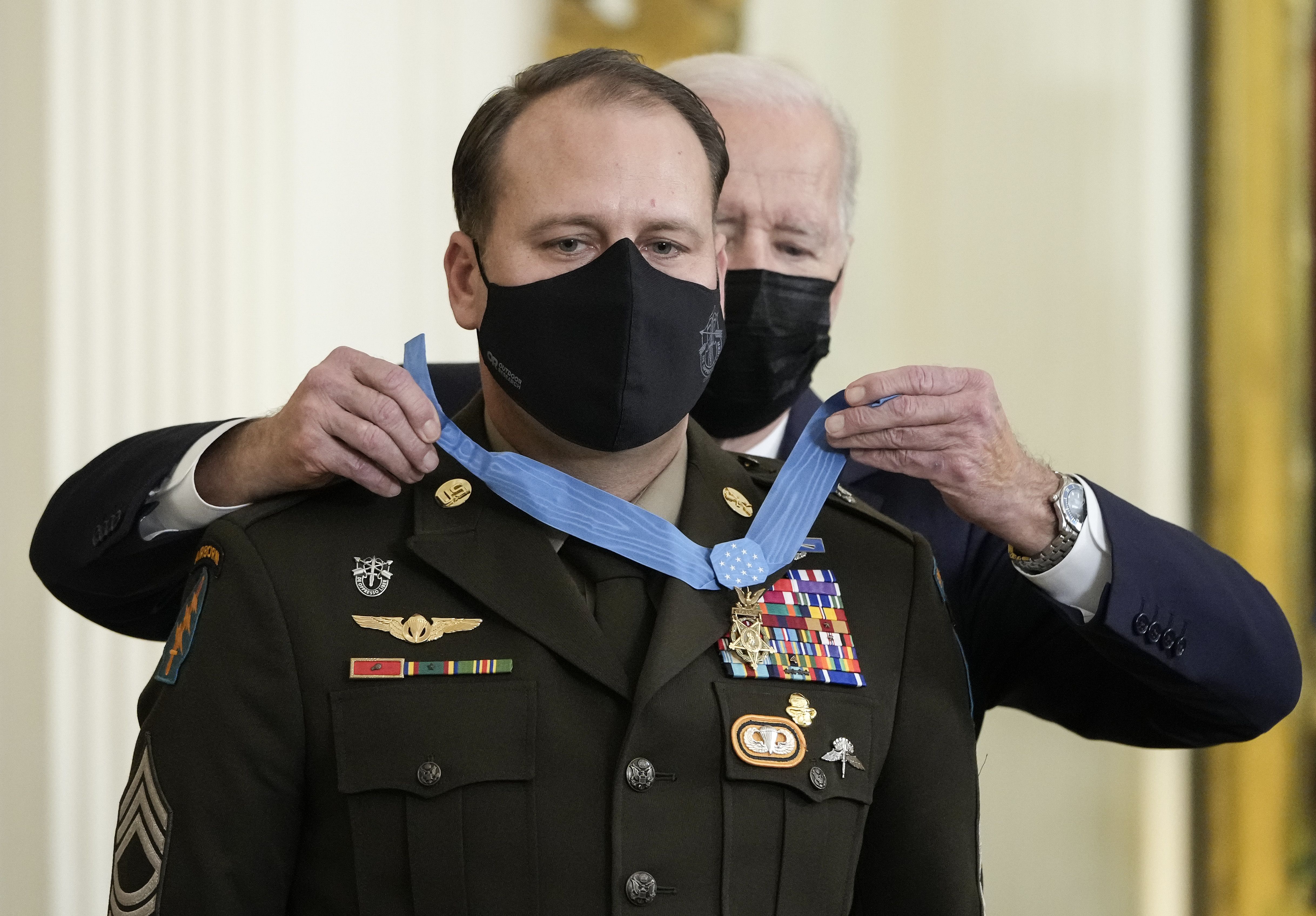 U.S. President Joe Biden awards the Medal of Honor to Army Master Sgt. Earl Plumlee 