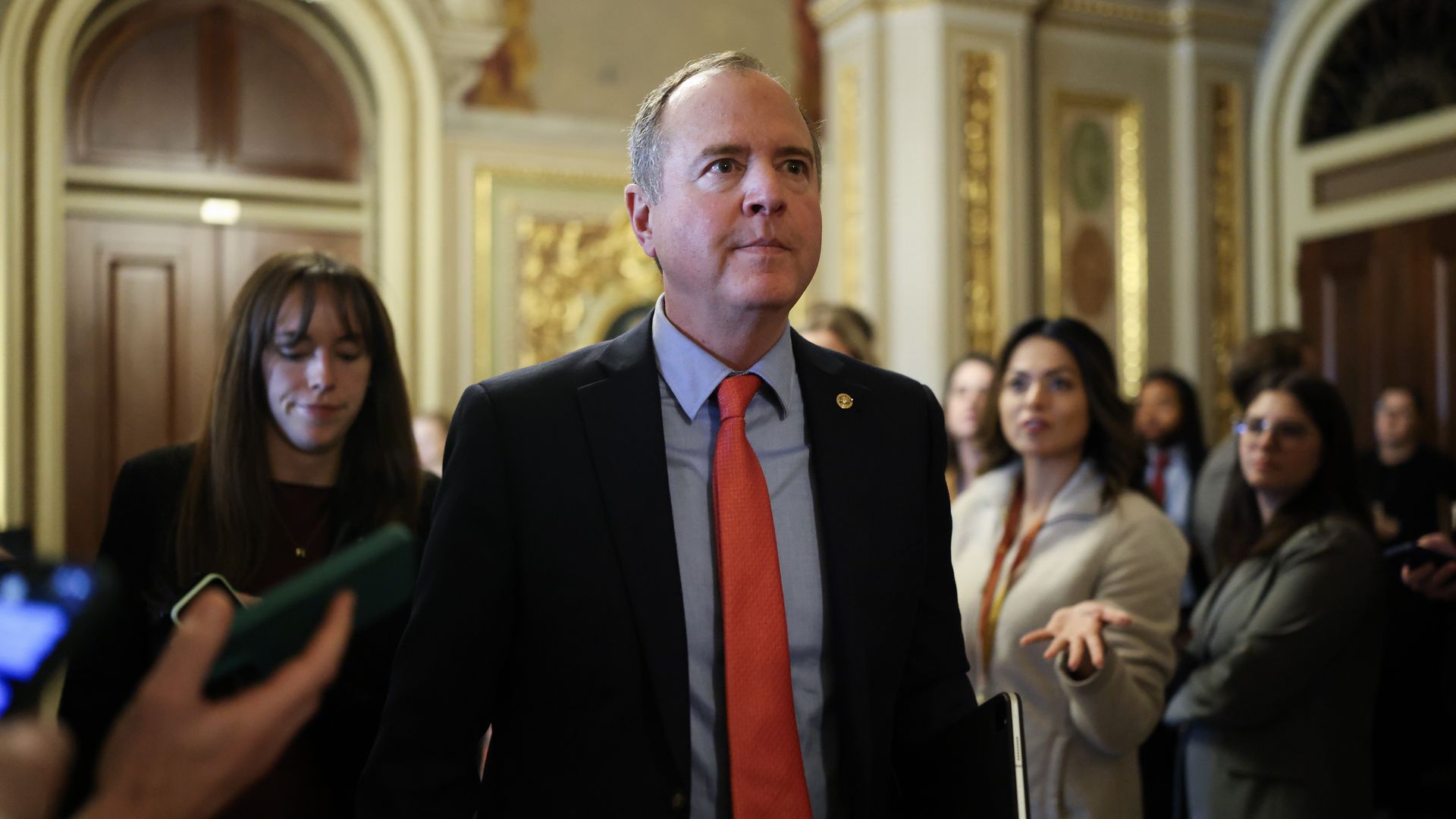 Sen. Adam Schiff (D-CA) leaves the Democratic caucus lunch at the U.S. Capitol on March 13, 2025 in Washington, DC. 