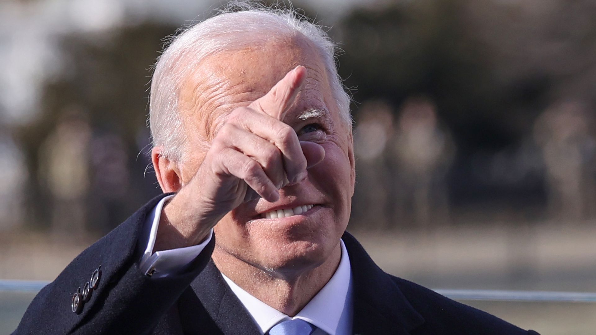 Picture of Joe Biden pointing upwards