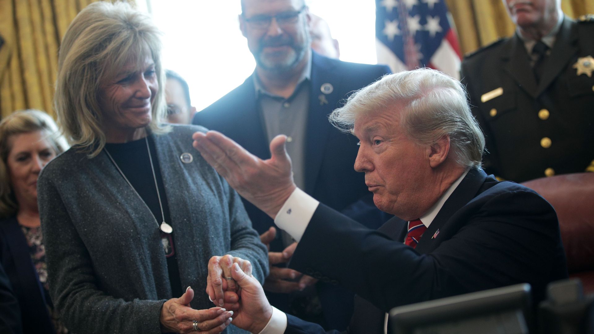 Mary Ann Mendoza with President Trump at the White House in 2019.