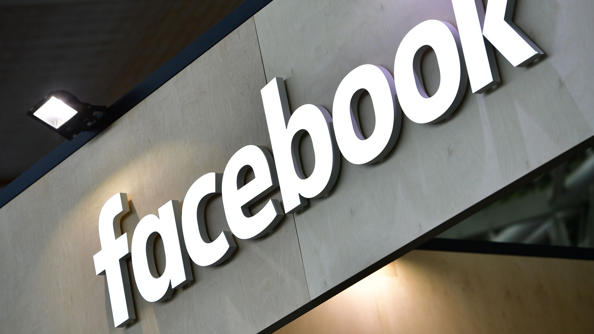 The Facebook logo on a sign