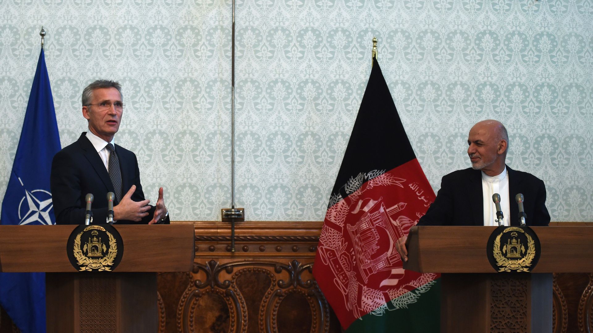 Secretary General of North Atlantic Treaty Organization (NATO) Jens Stoltenberg (L) gestures as speaks during a joint press conference with Afghan President Ashraf Ghani