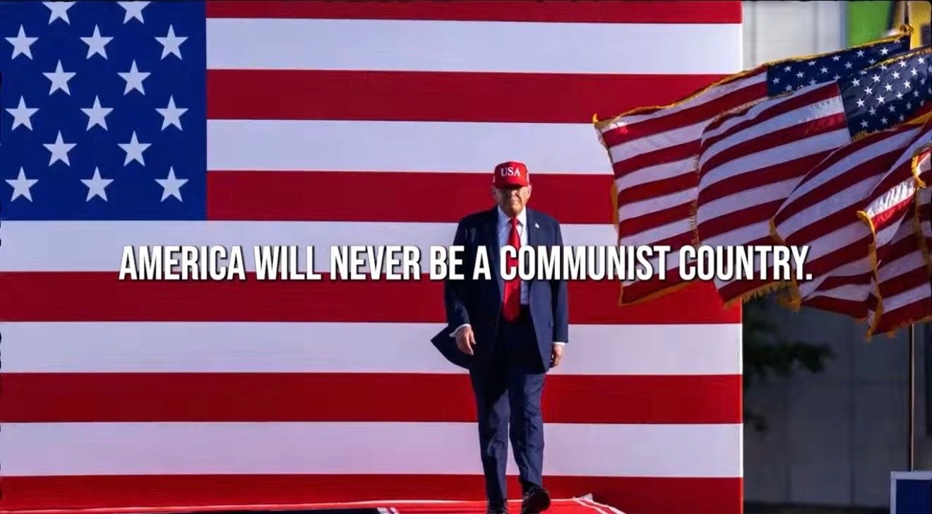 Screenshot of a White House ad with President Trump standing in front of an American flag with text over it: "America will never be a communist country"
