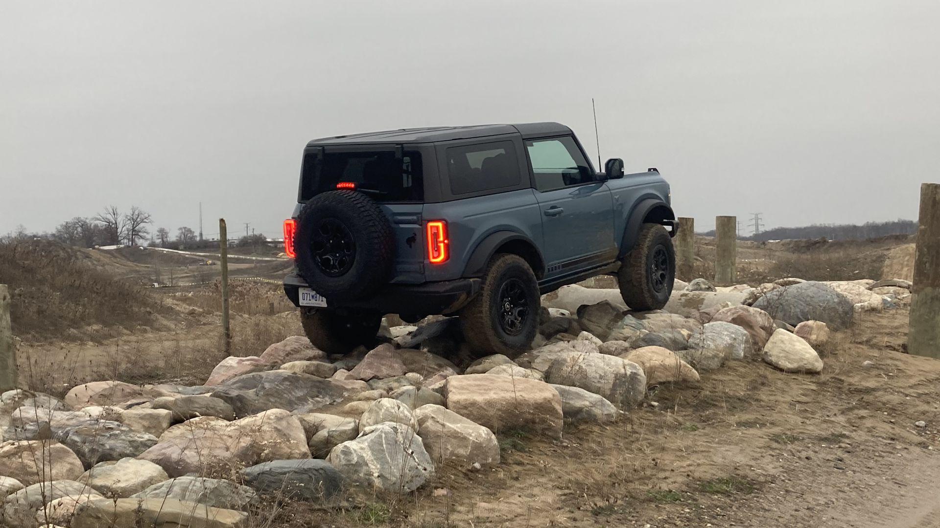 The author crawls over a rock bed in a 2022 Ford Bronco