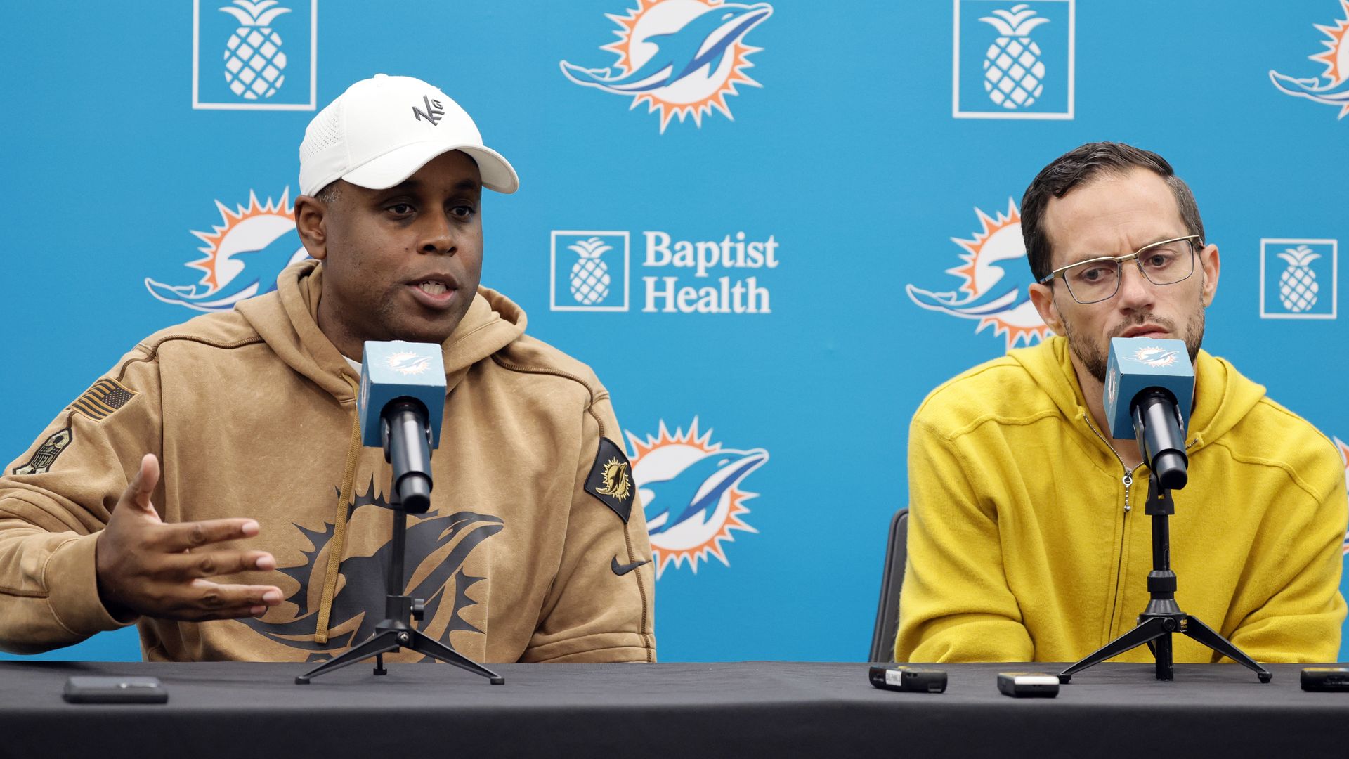 Miami Dolphins general manager Chris Grier, left, and head coach Mike McDaniel