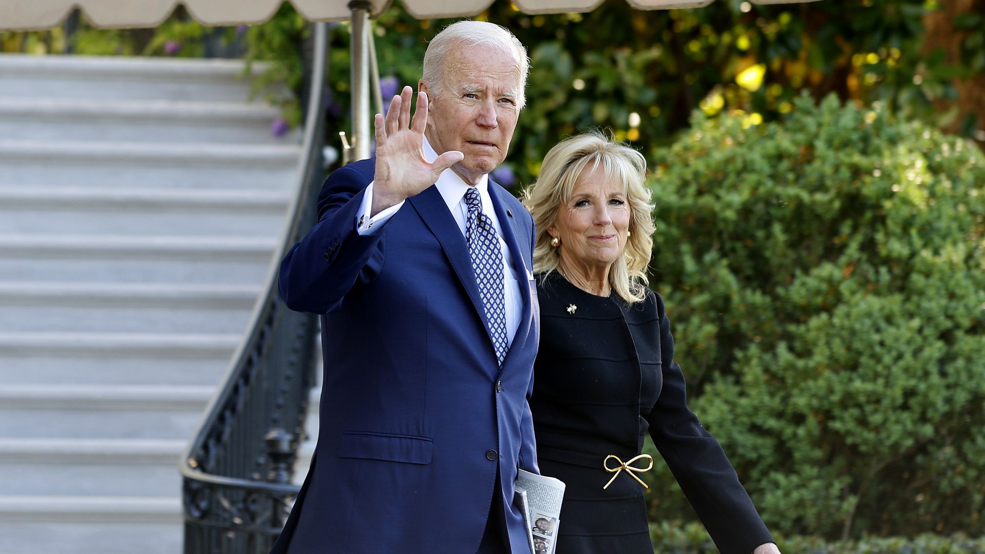Joe and Jill Biden walking outside.