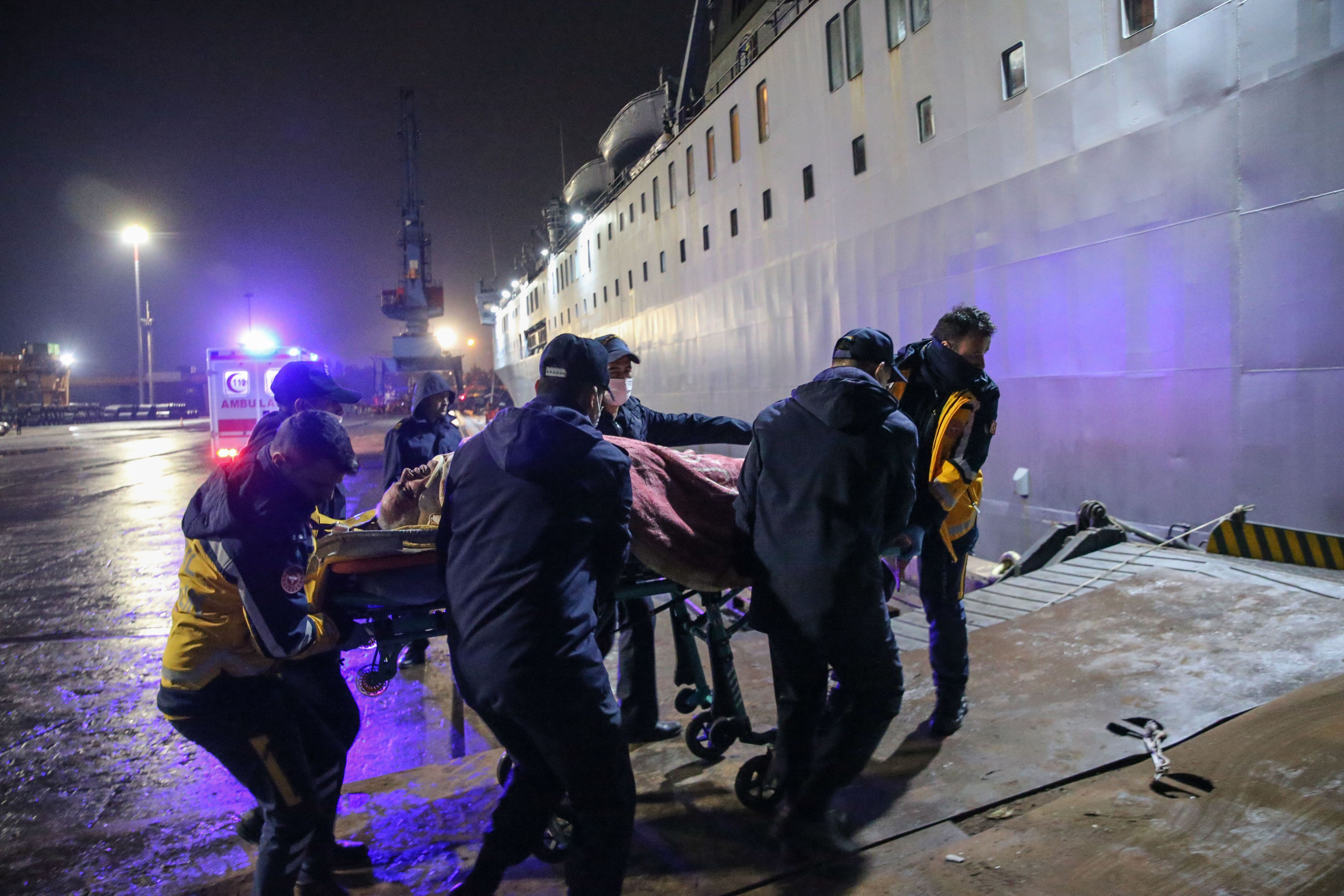 People injured in the earthquake in Hatay are taken to a ship to be transferred to Mersin, Turkey, on Feb. 7. 