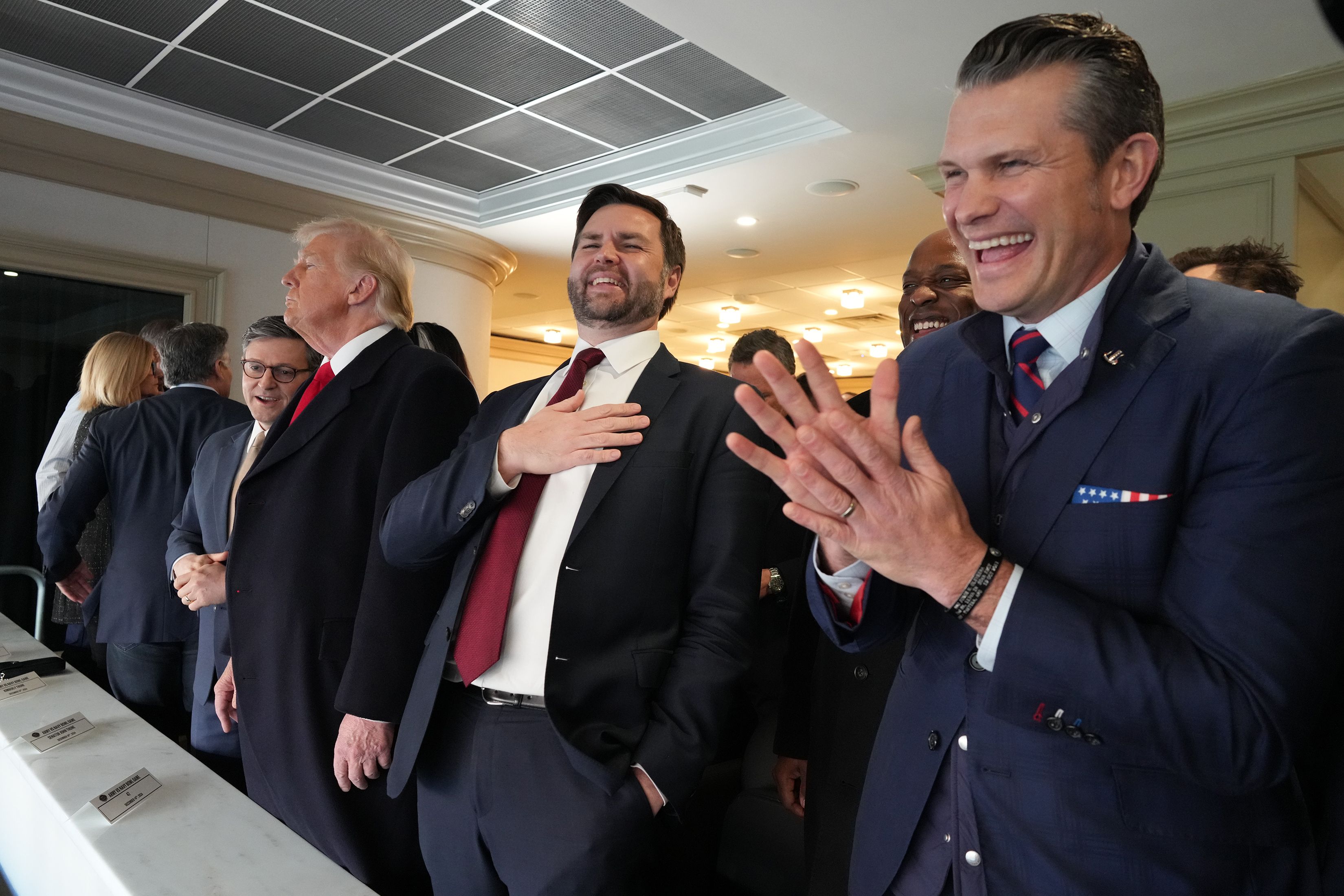 Hegseth claps at the game