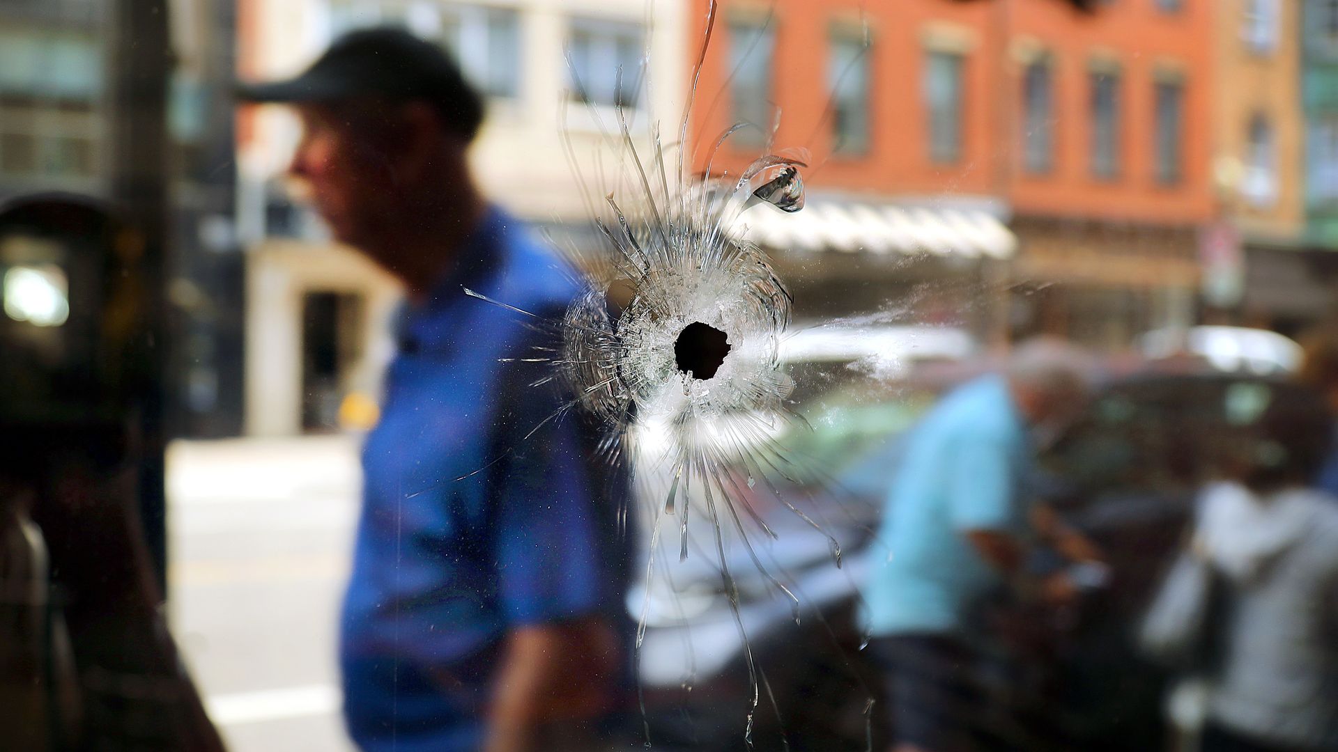 A close up of the bullet hole in Modern Pastry's window from a shooting on July 12, 2023.