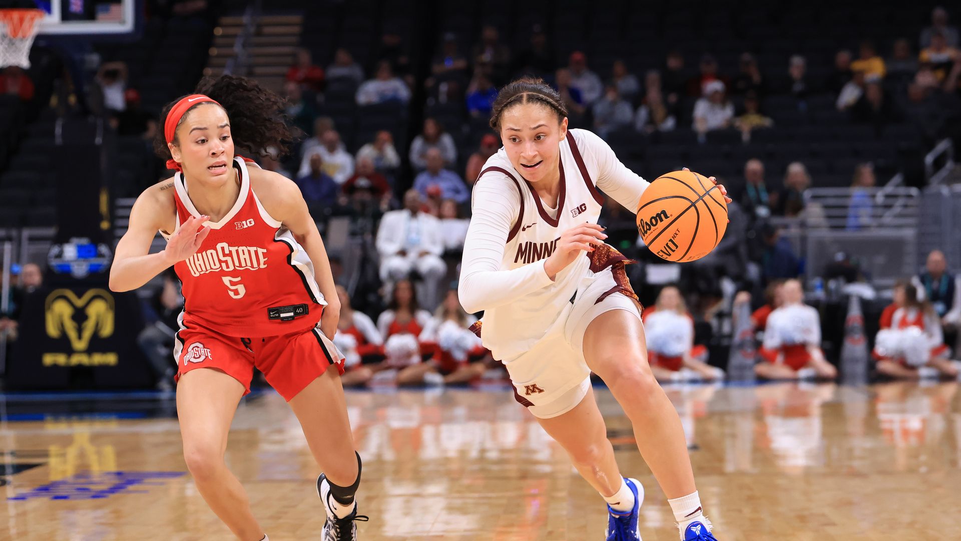 Amaya Battle #3 of the Minnesota Golden Gophers drives to the basket against Ava Watson #5 of the Ohio State Buckeyes during the second half during the Quarterfinals of the 2026 Big Ten Women's Basketball Tournament.