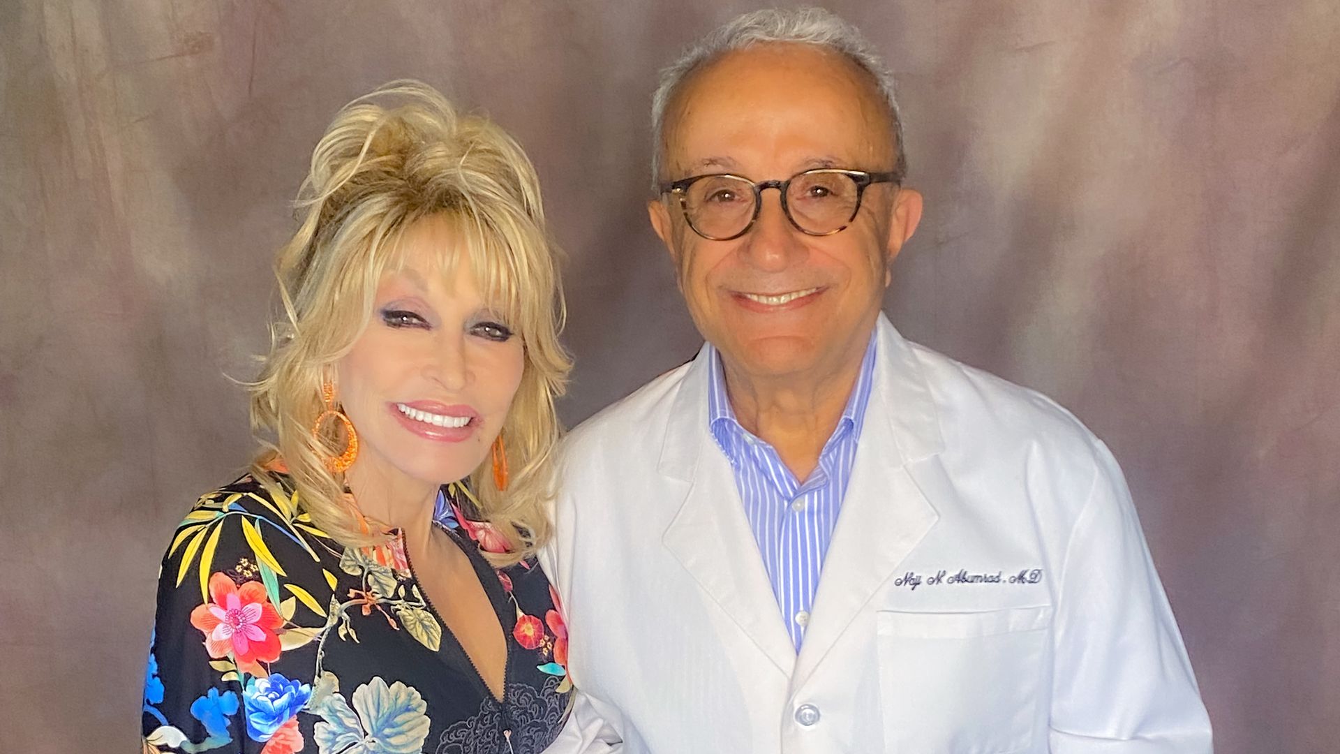 Dolly Parton with VUMC doctor Naji Abumrad.