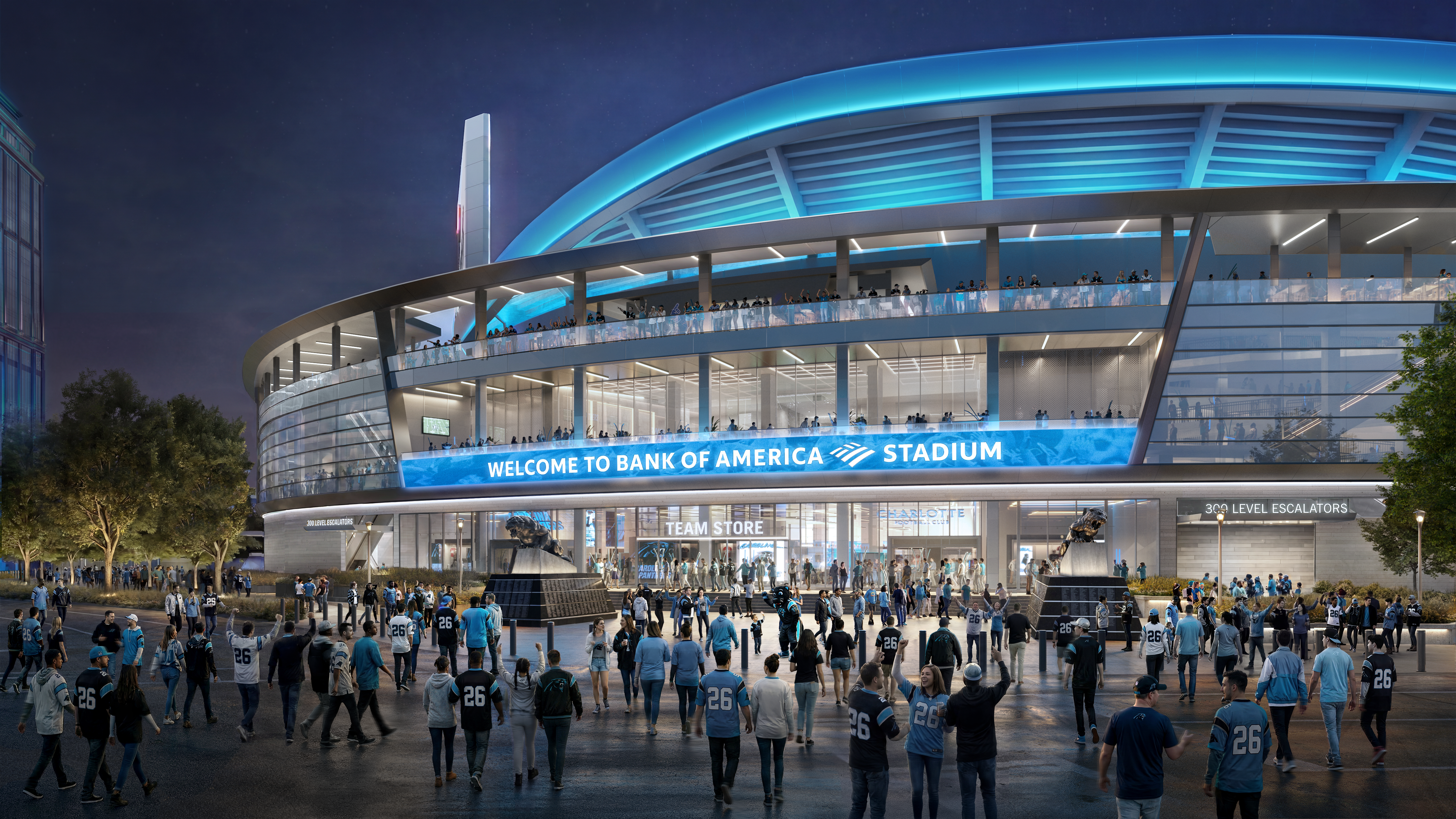 Nighttime view of a futuristic stadium with a blue-lit curved roof, glass balconies, and crowds wearing blue jerseys; a large sign reads "WELCOME TO BANK OF AMERICA STADIUM".