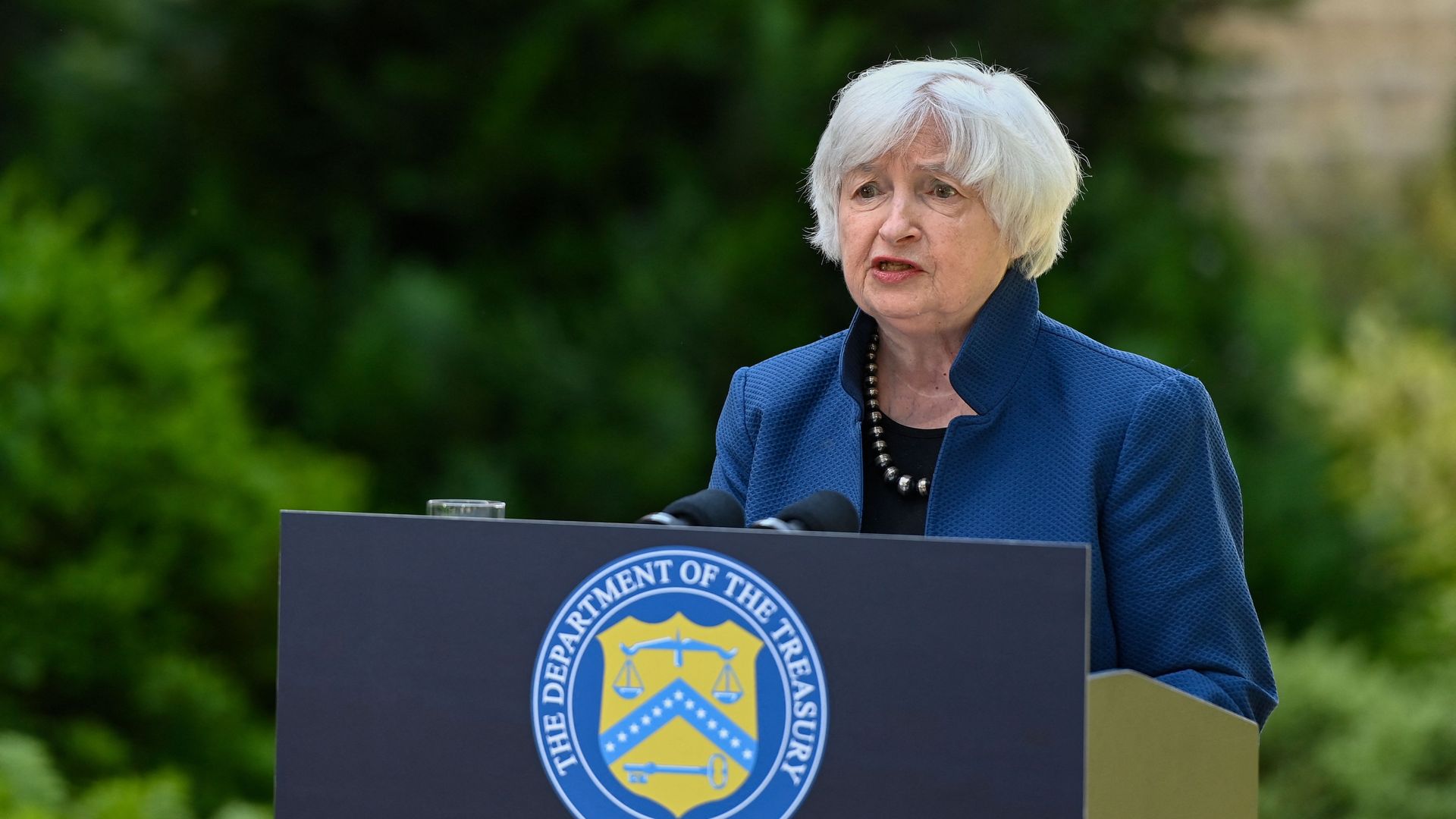 Janet Yellen at a lectern 