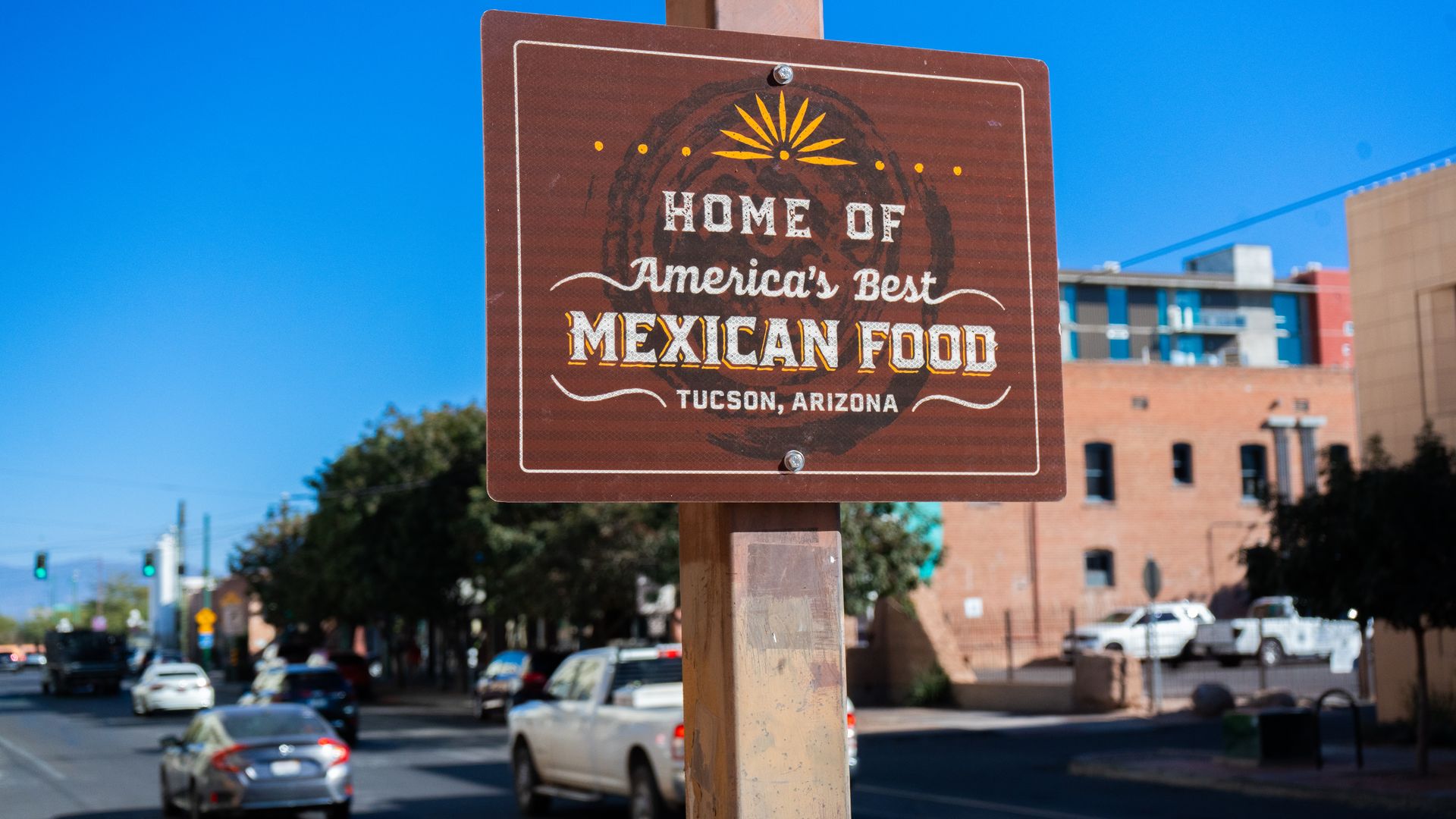 A sign that says, "Home of American's Best Mexican Food Tucson, Arizona."