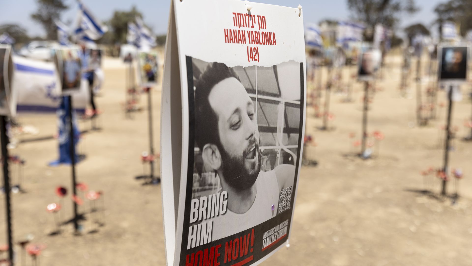 A poster with a photo of Hanan Yablonka at the 'Nova Festival' site.
