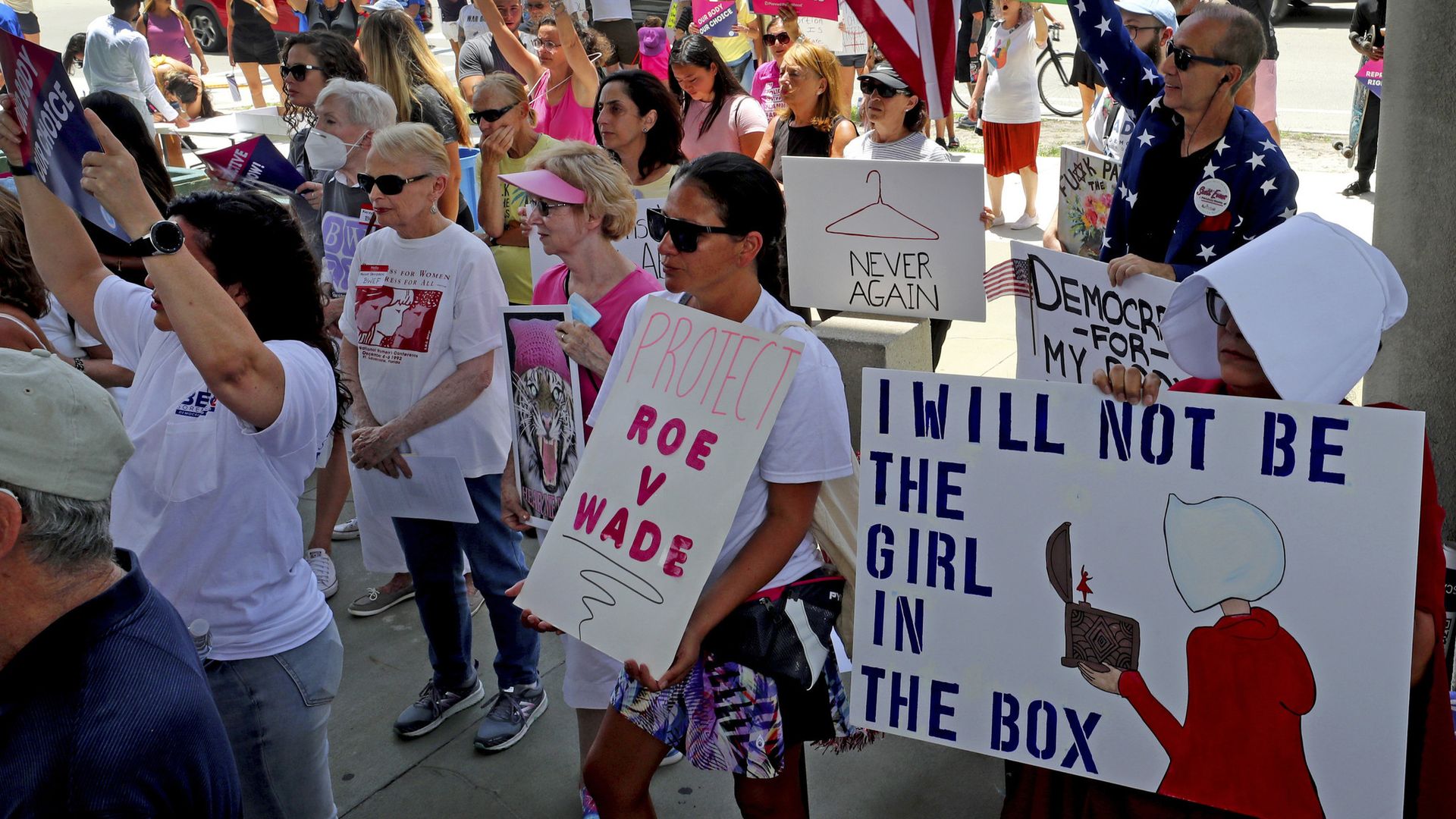 People gather on the steps of the Federal Courthouse in Fort Lauderdale on May 7, 2022 for a rally to support abortion rights.