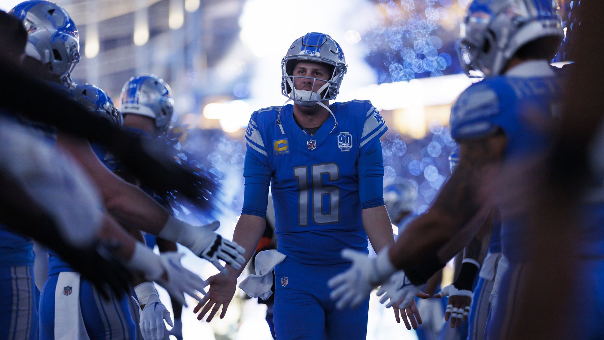 Lions QB Jared Goff runs onto the field during introductions before playing the Los Angeles Rams at Ford Field. 