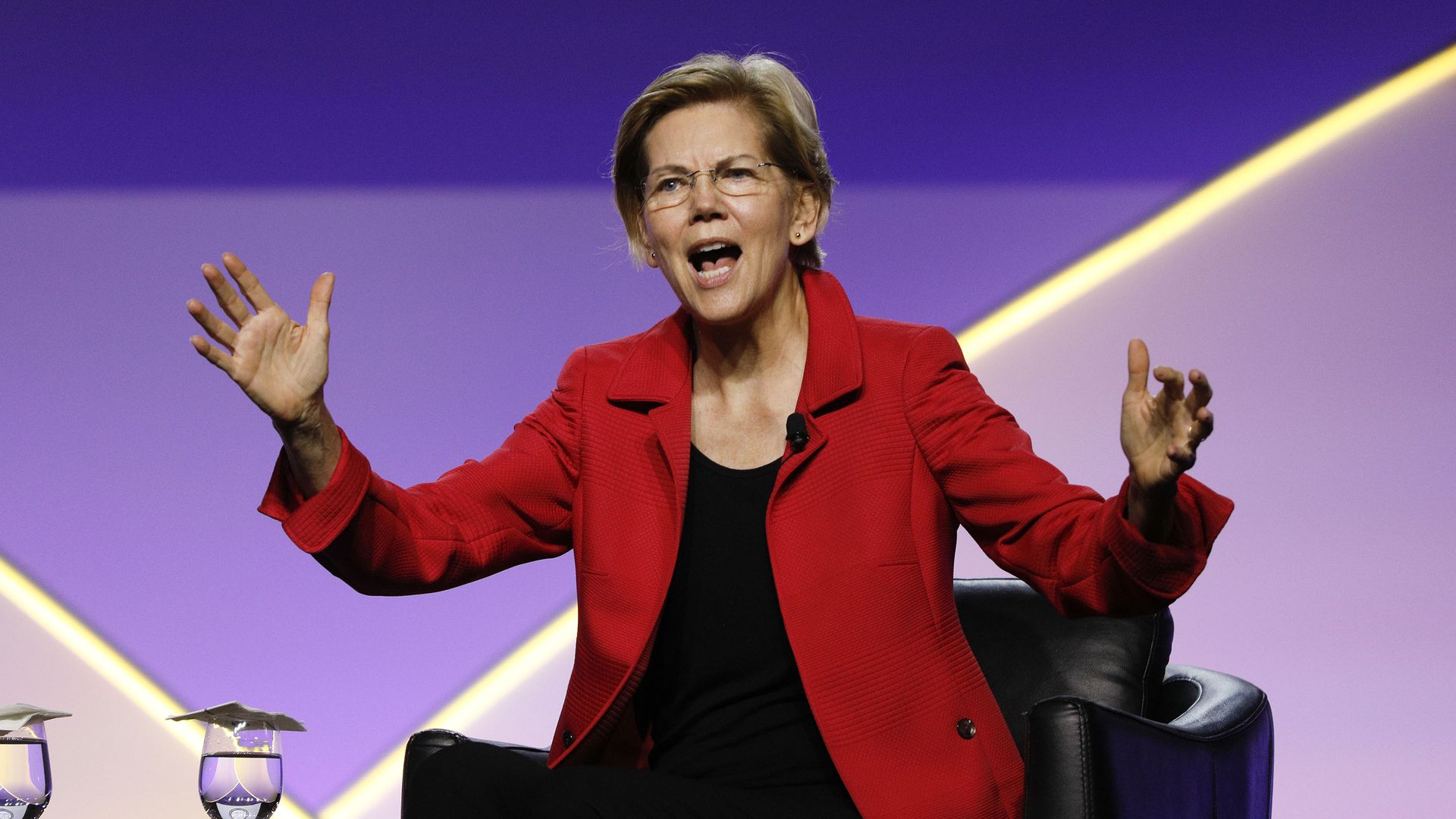 Warren sitting down.