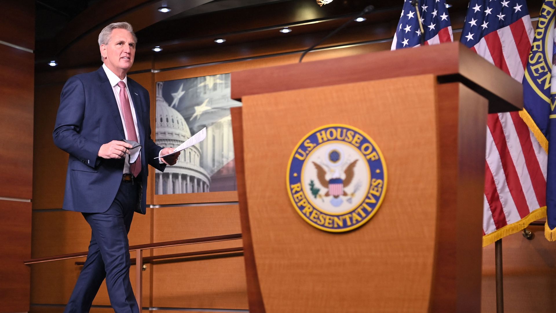 House Republican Leader Kevin McCarthy walks toward a podium on Capitol Hill.