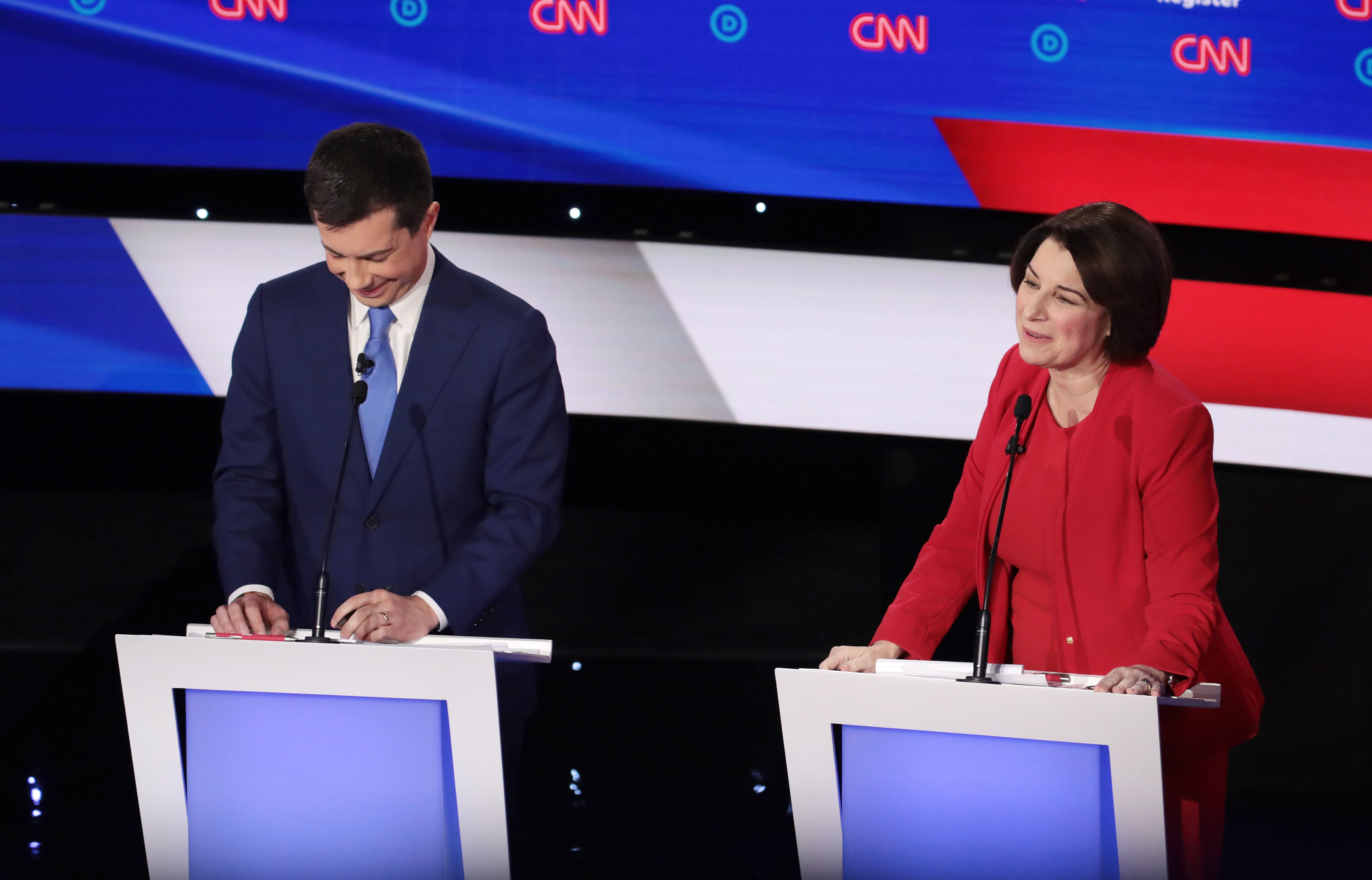  Sen. Amy Klobuchar (D-MN) and South Bend, Indiana Mayor Pete Buttigieg participate in the Democratic presidential primary debate at Drake University on January 14, 2020 in Des Moines, Iowa. 