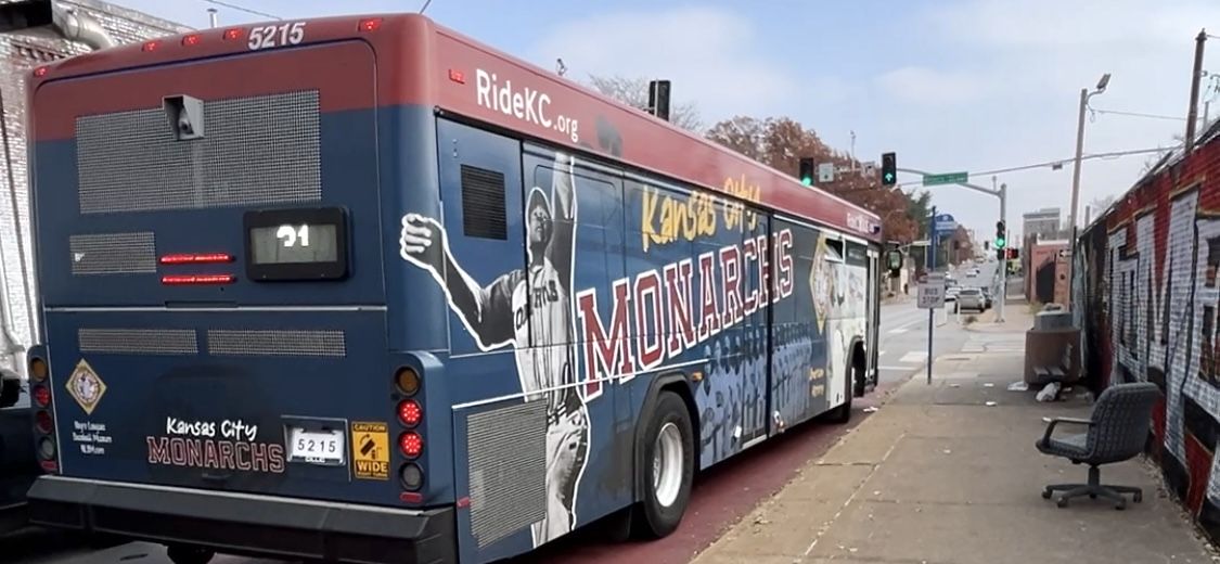 A Ride KC bus on Route 31 is wrapped in a Kansas City Monarchs design.