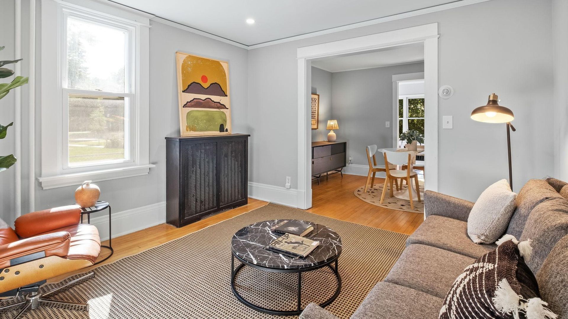 living room with view of dining room