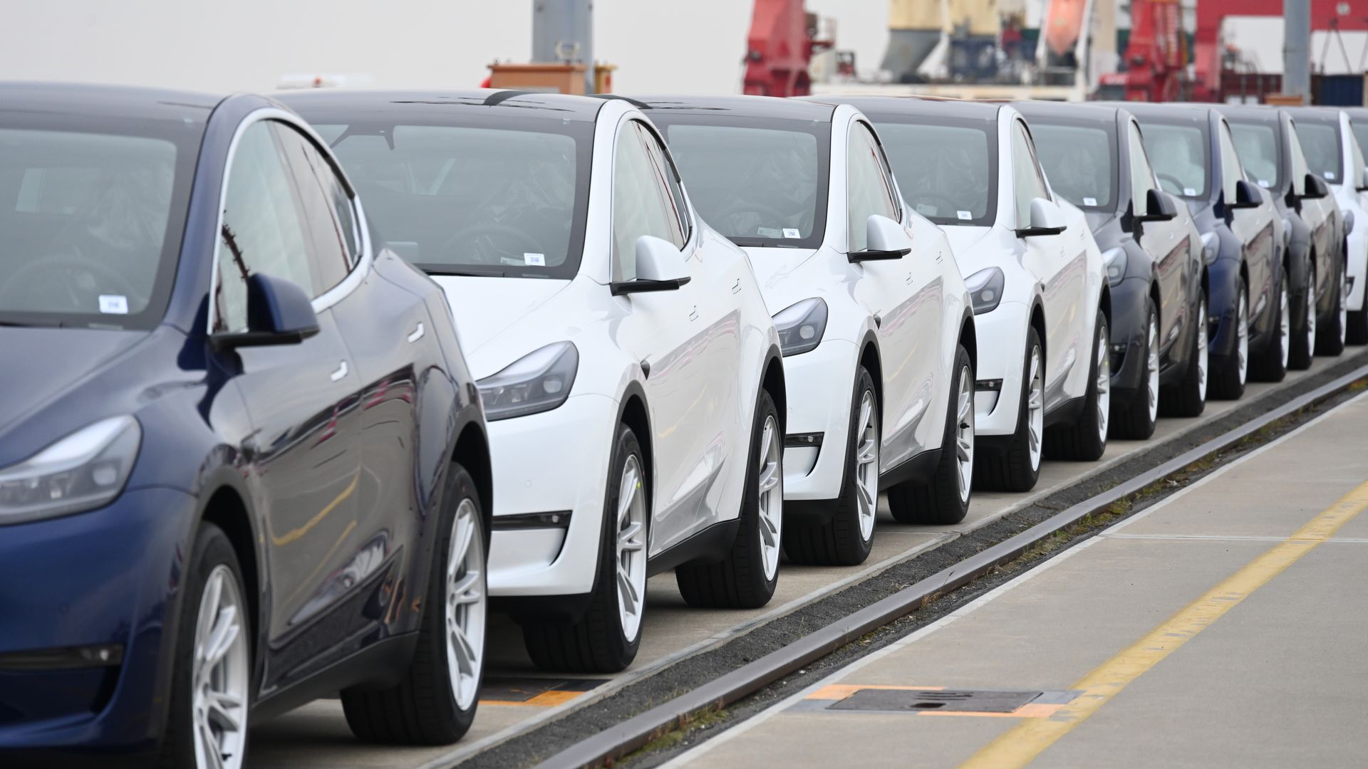 Tesla Model Y and Model 3 vehicles at a dock in Shanghai, China, in May 2022.